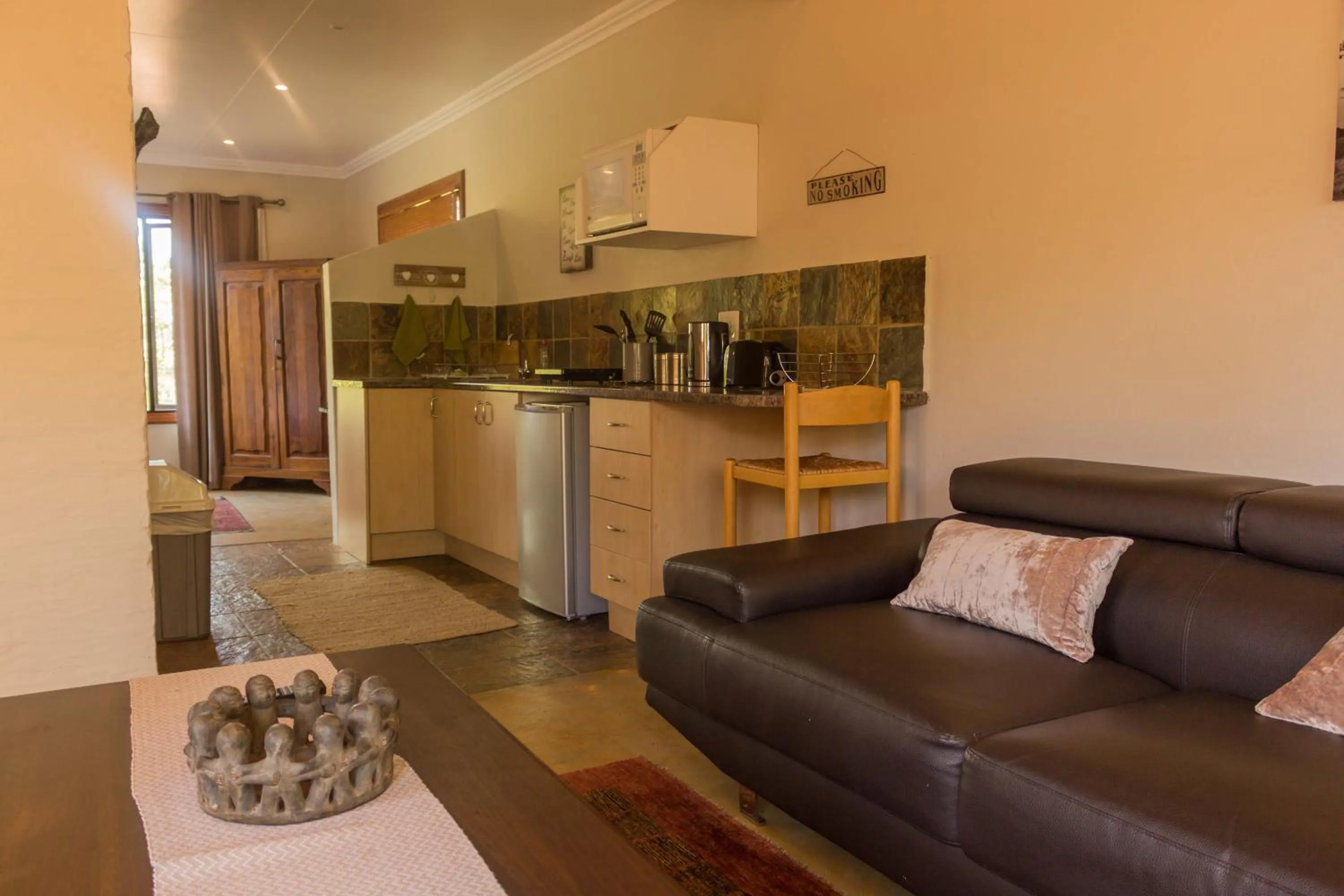 Kitchen or kitchenette in Moonflower Cottages