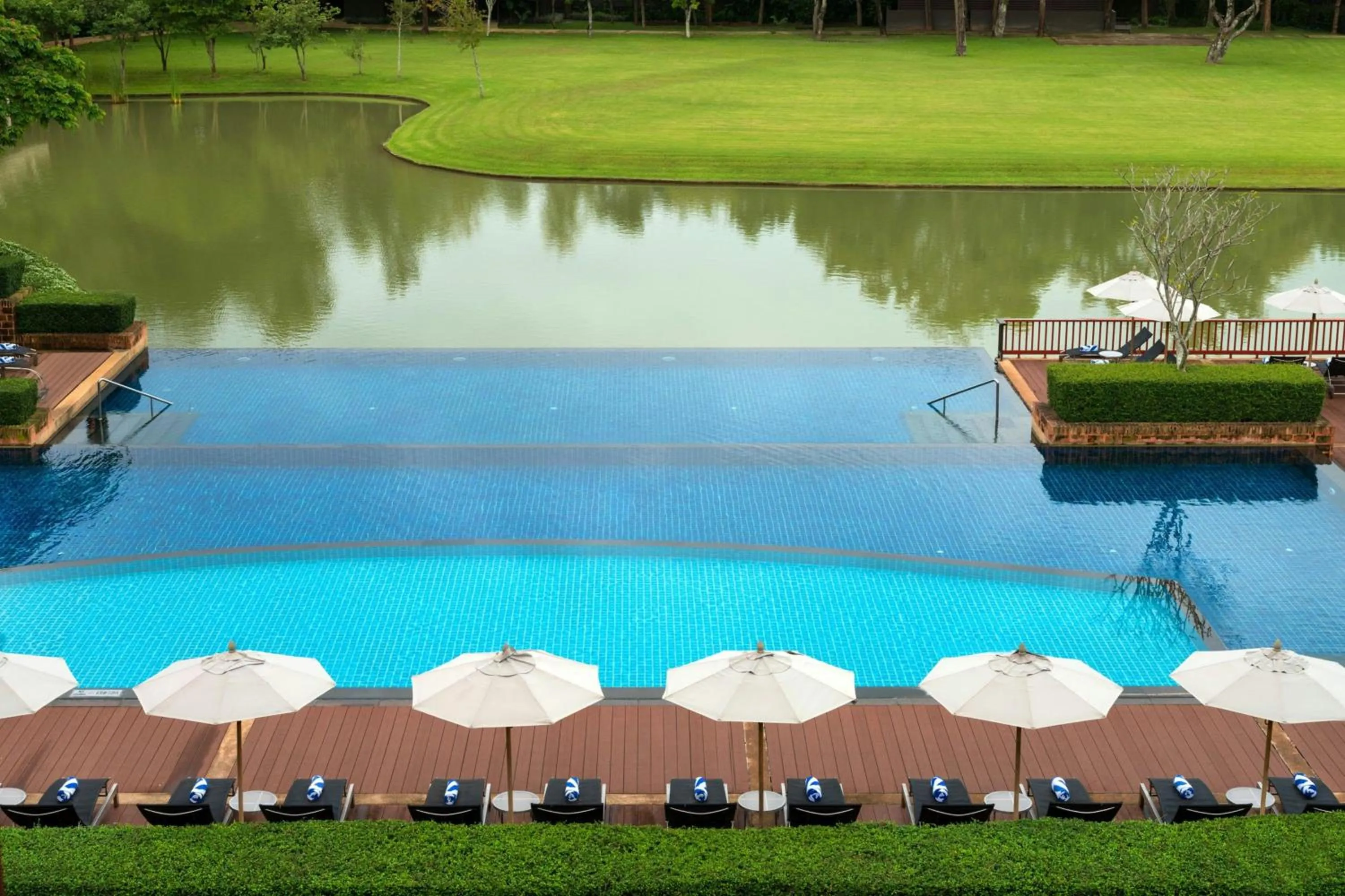Swimming pool in Le Meridien Chiang Rai Resort, Thailand