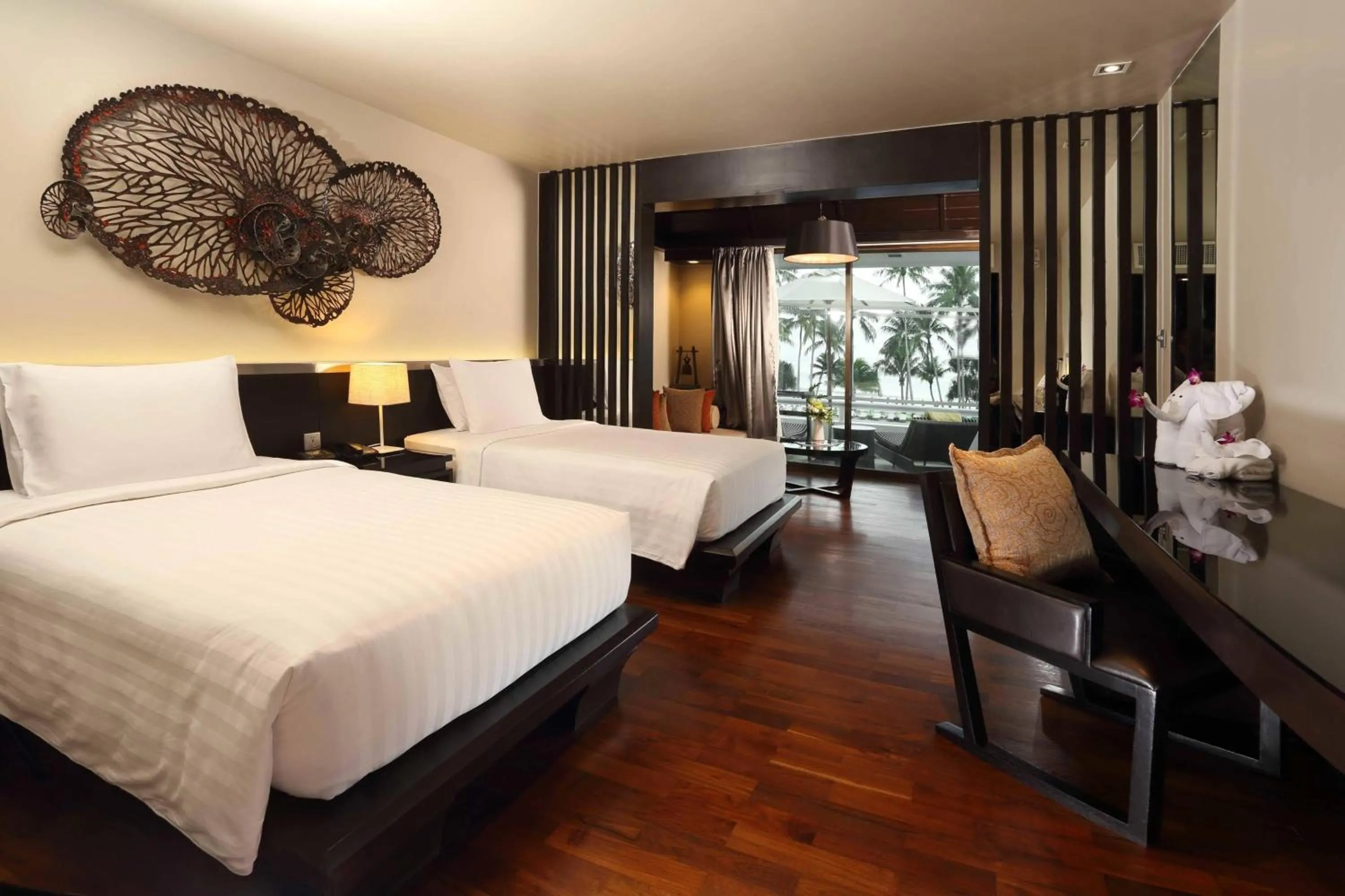 Photo of the whole room, Bed in Le Meridien Phuket Beach Resort