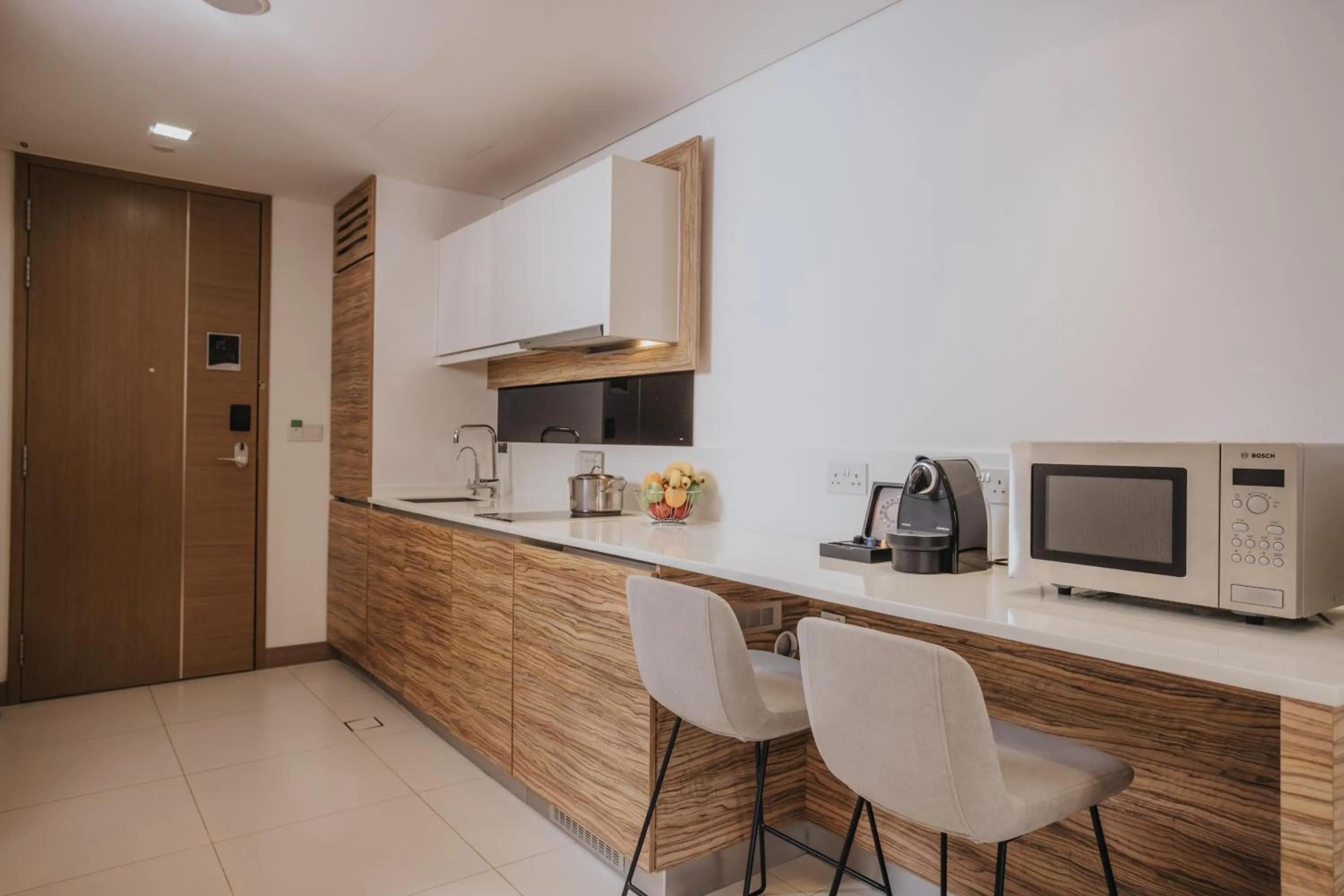 kitchen in Novotel Living Singapore Orchard