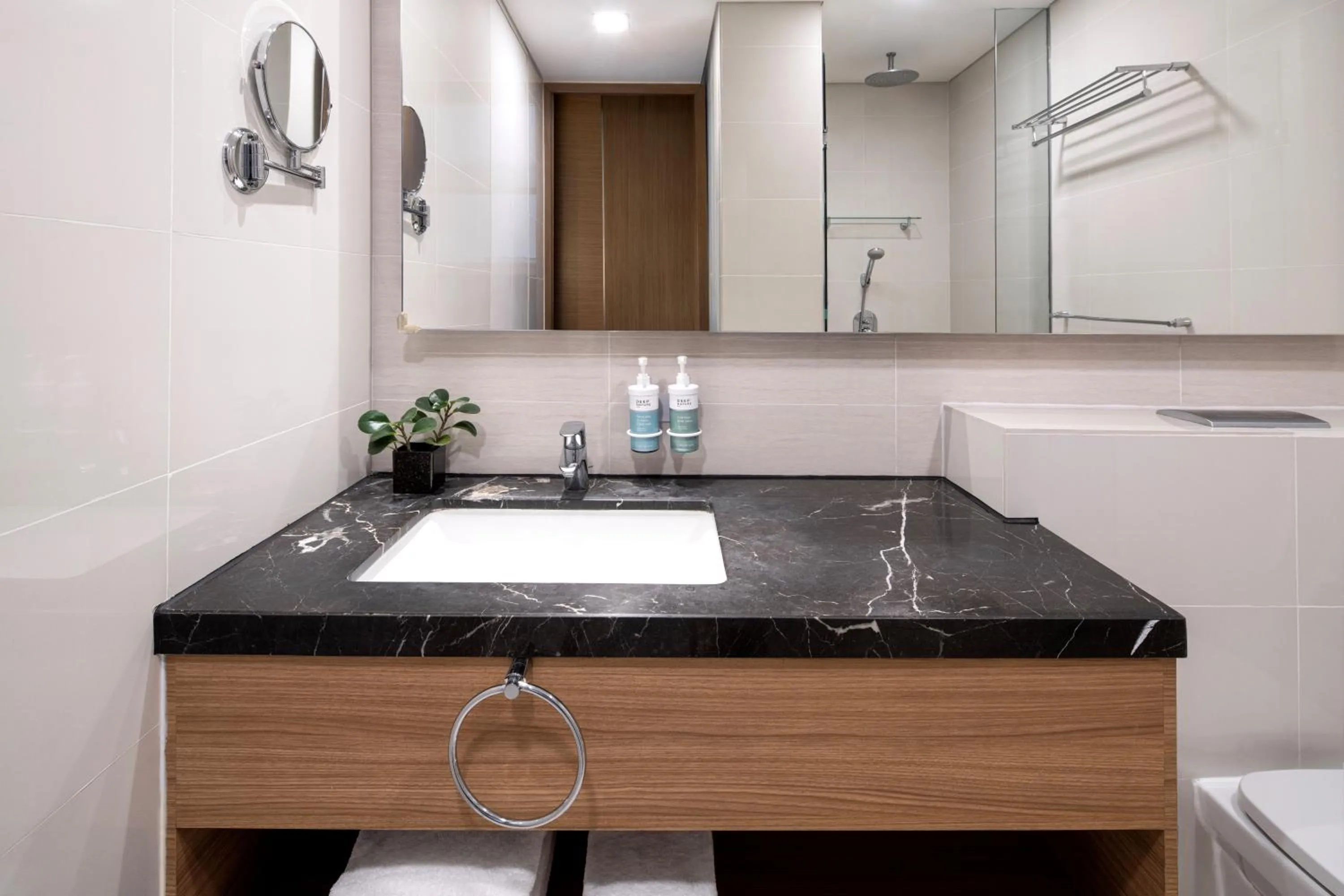 Bathroom in Novotel Living Singapore Orchard