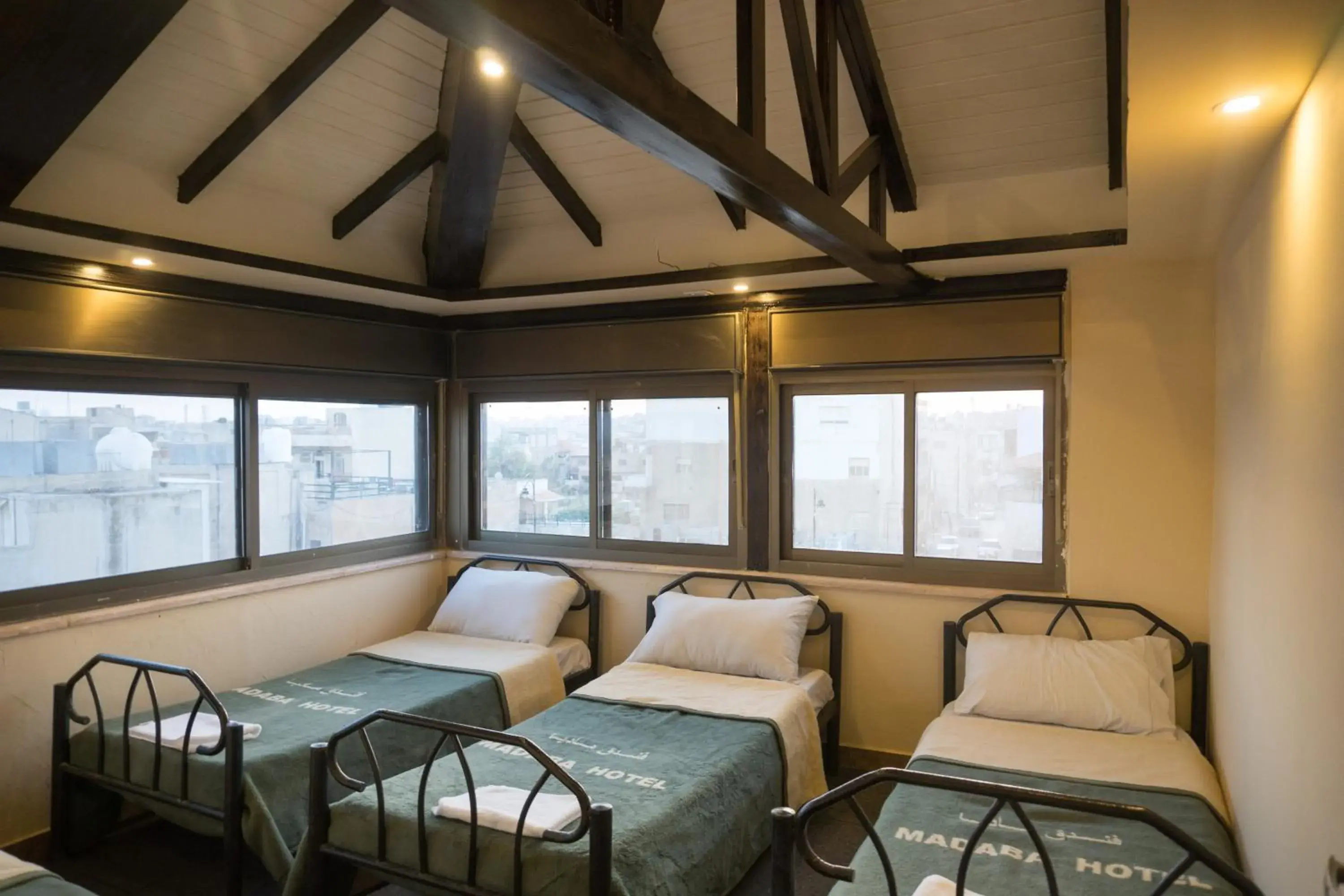 Single Bed in Male Dormitory Room in Madaba Hotel Single Bed in Male Dormitory Room in Madaba Hotel