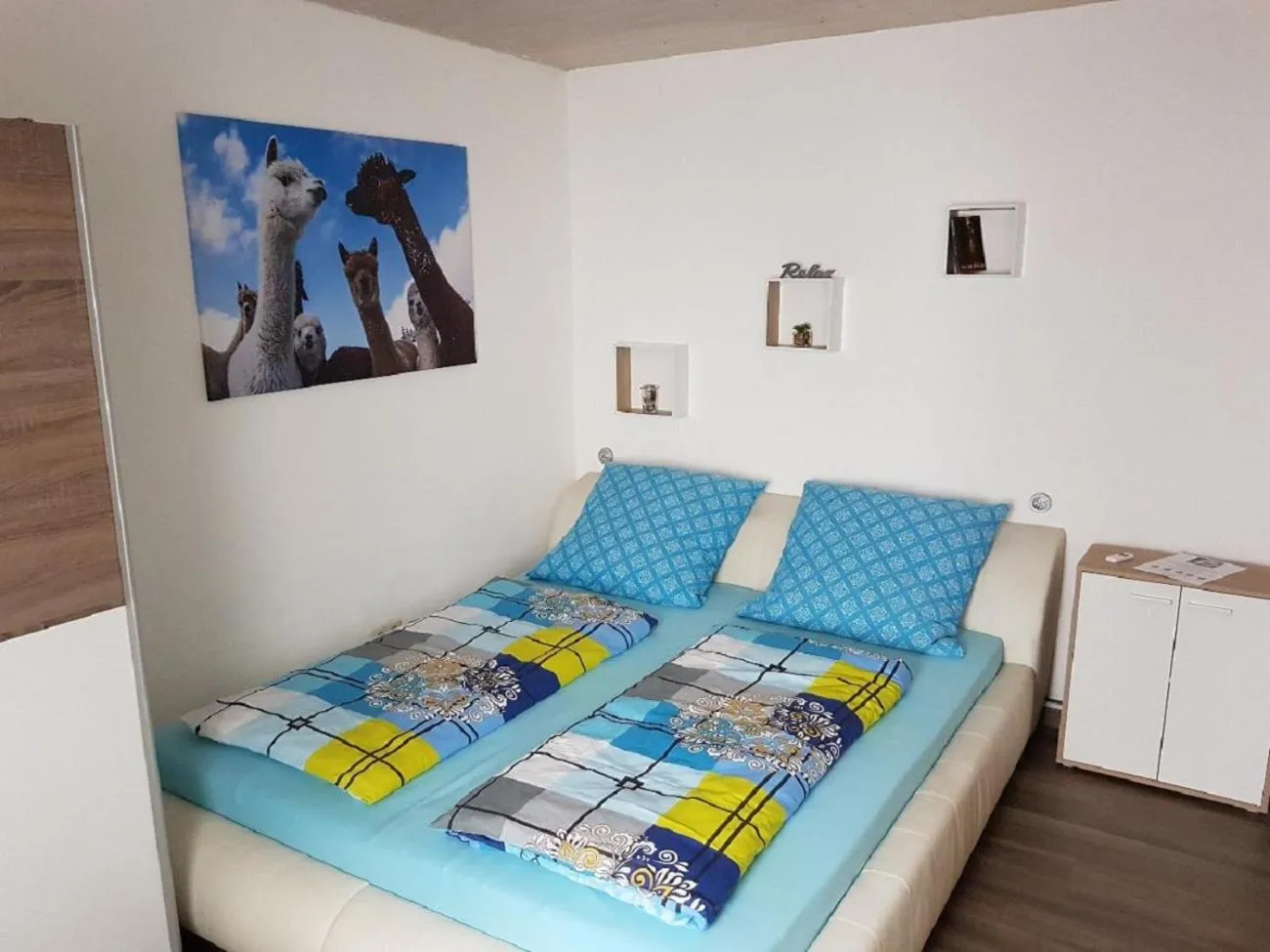 Bed in Ferienwohnung Dersch