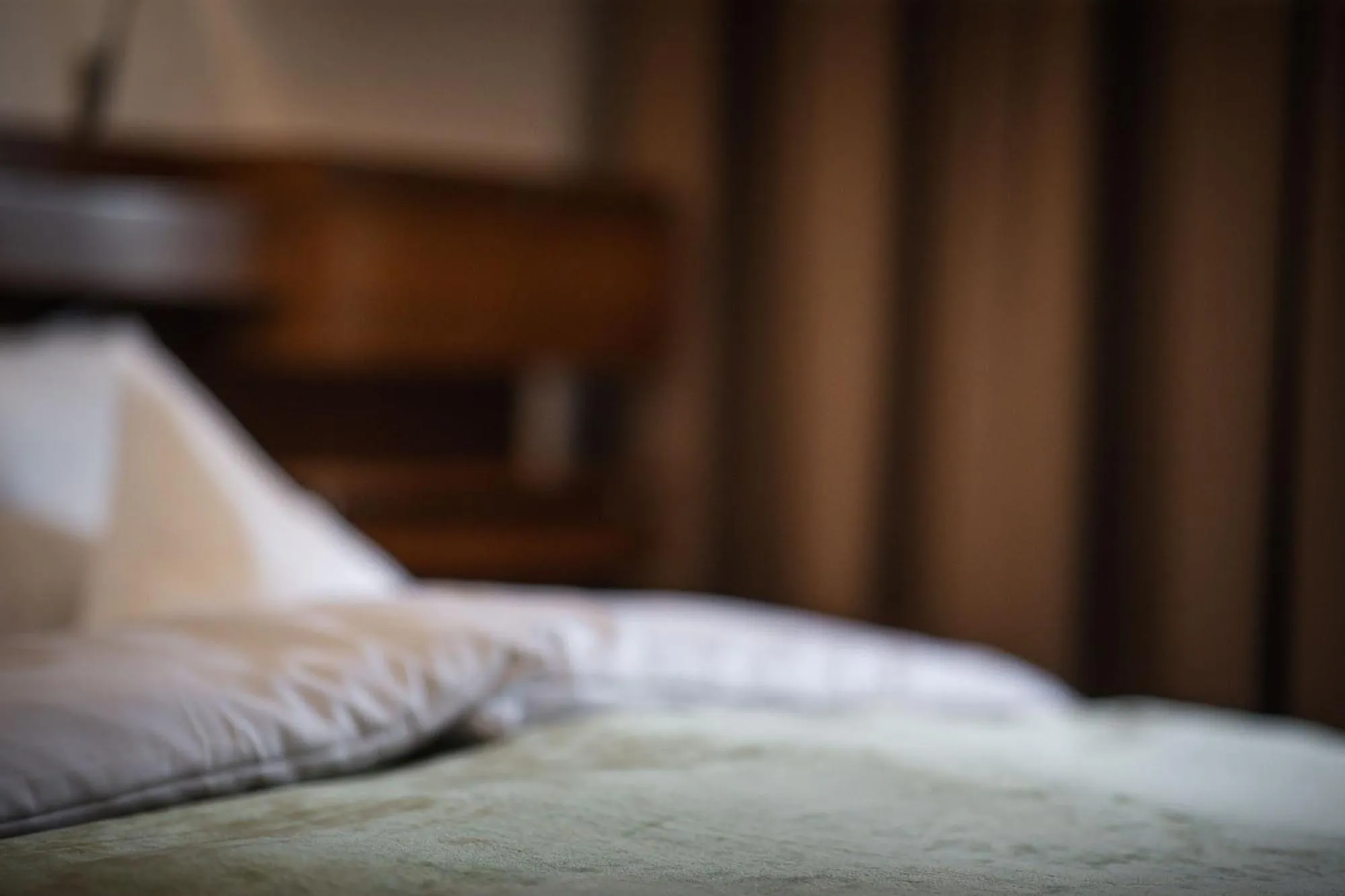 Bed in Hotel Mühlwald