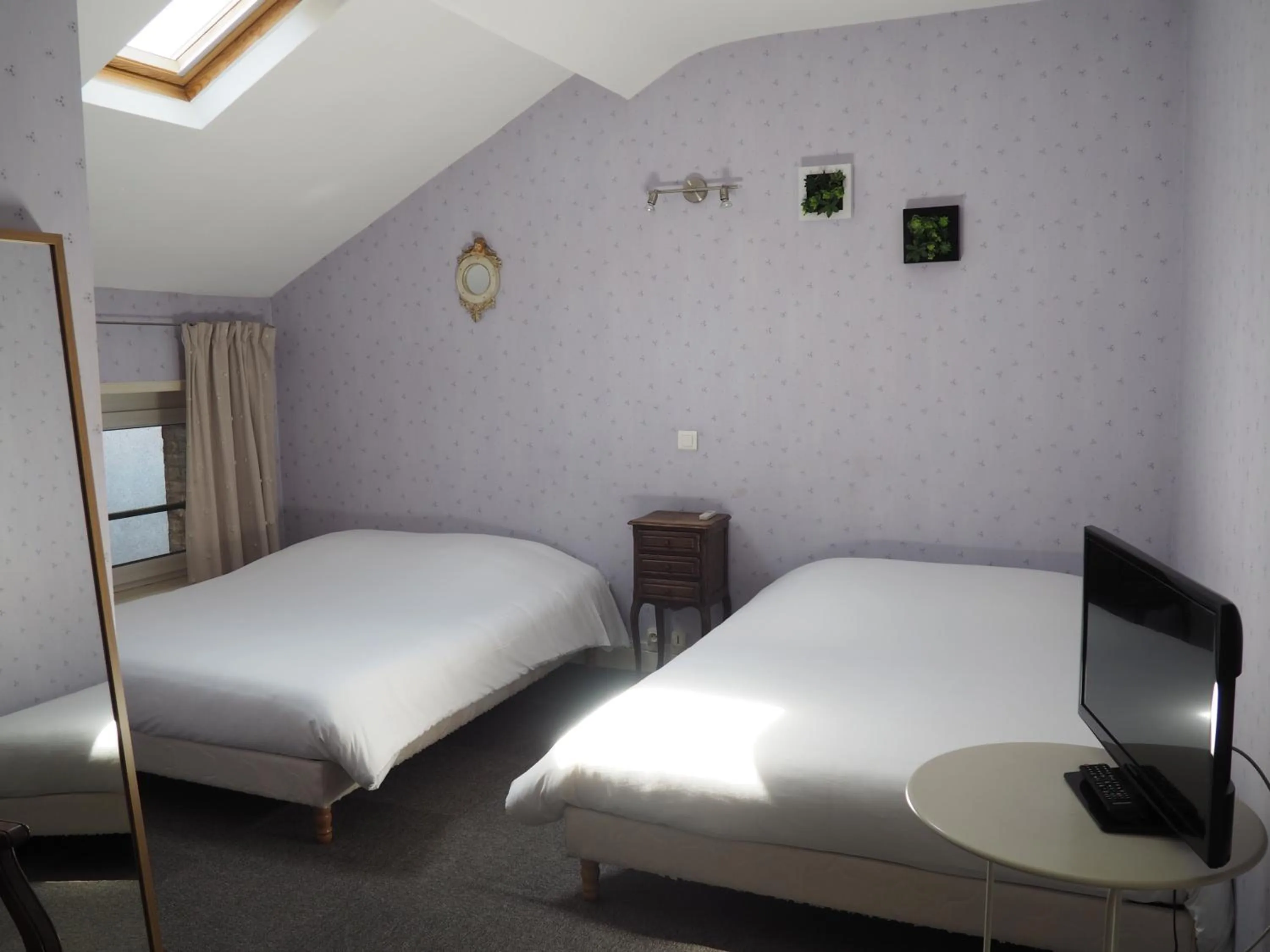 Bed in Hôtel La Villa Lorraine