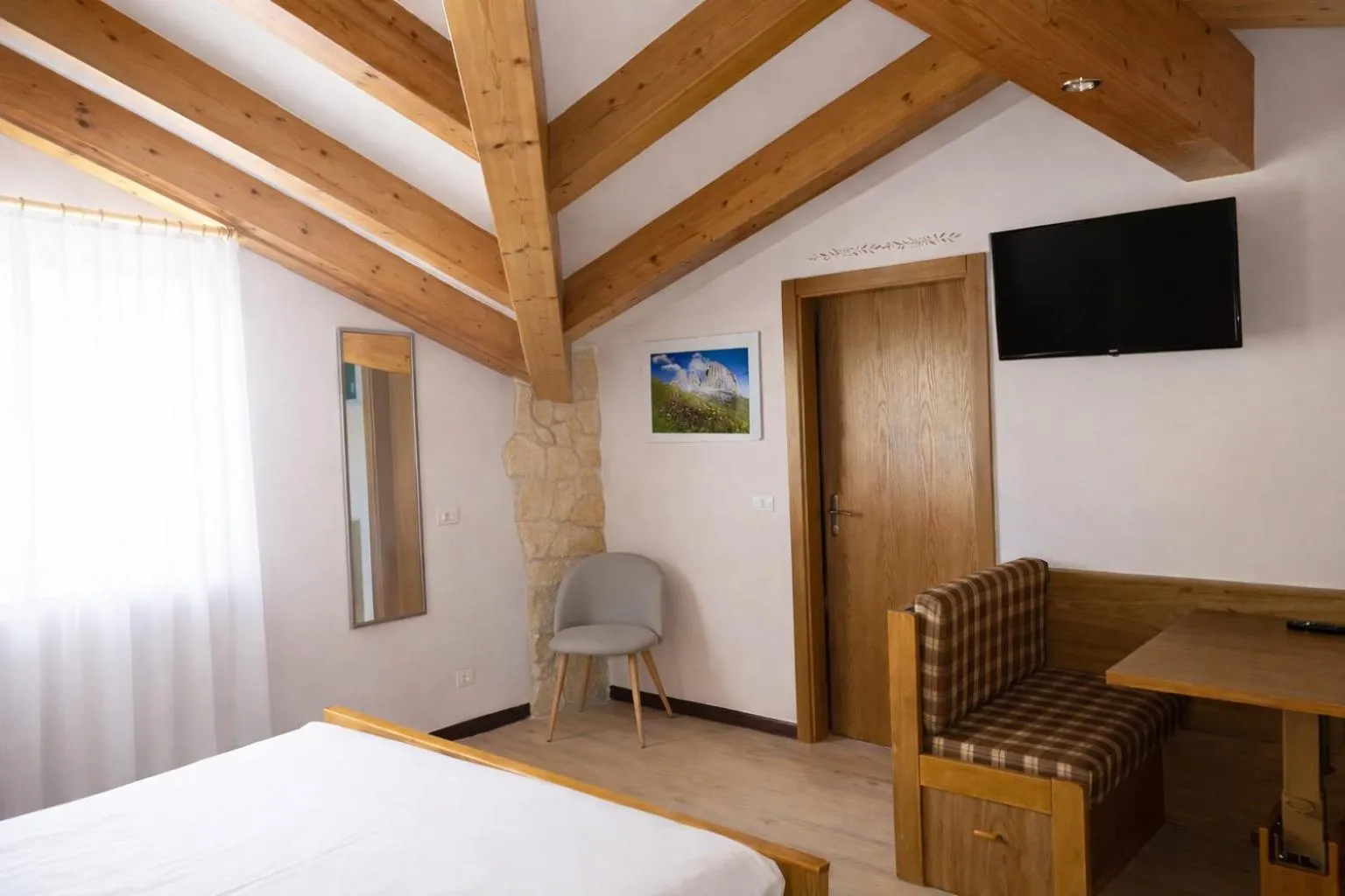 Bed in Hotel Rododendro Val di Fassa