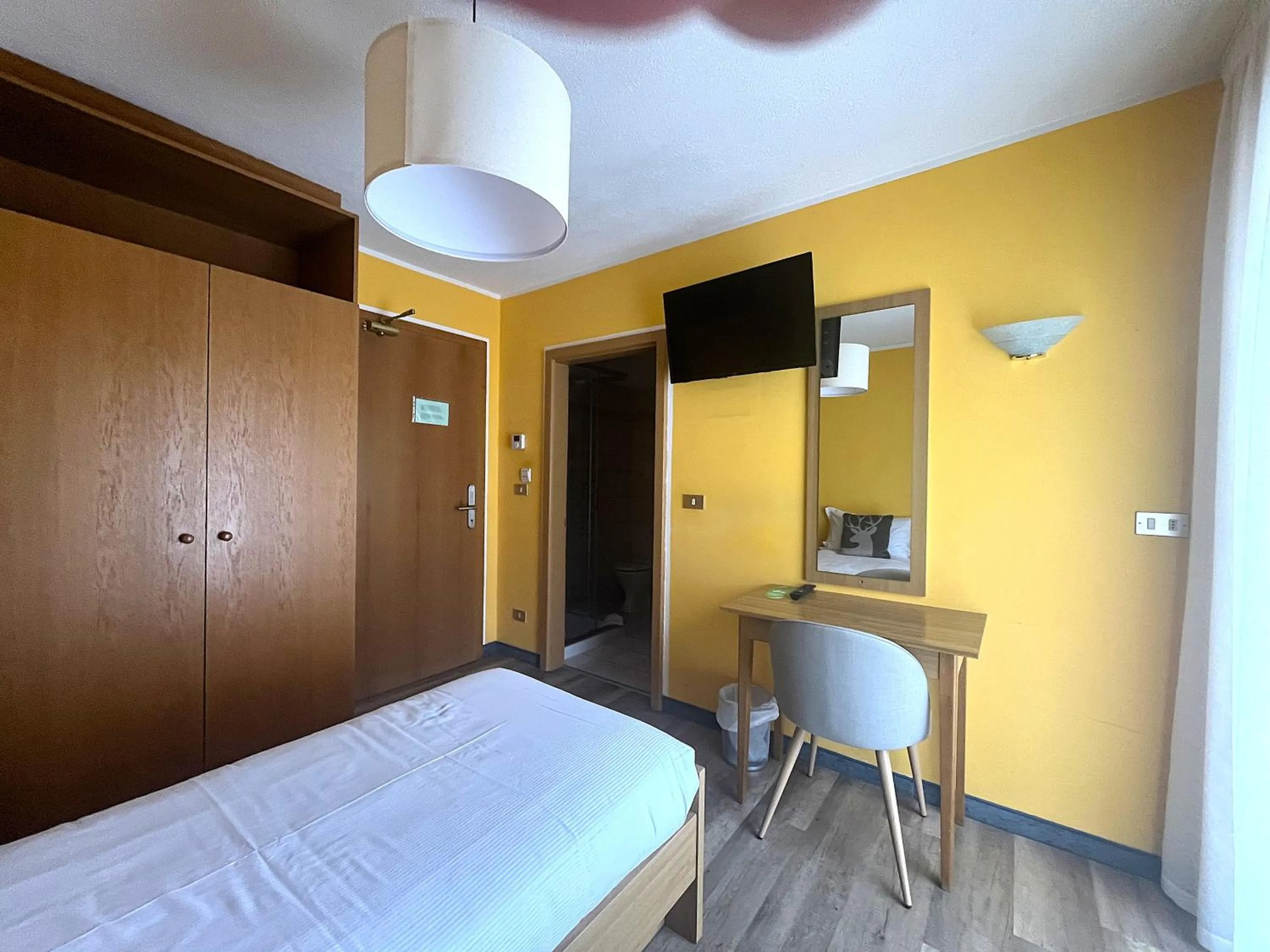 Bed in Hotel Rododendro Val di Fassa