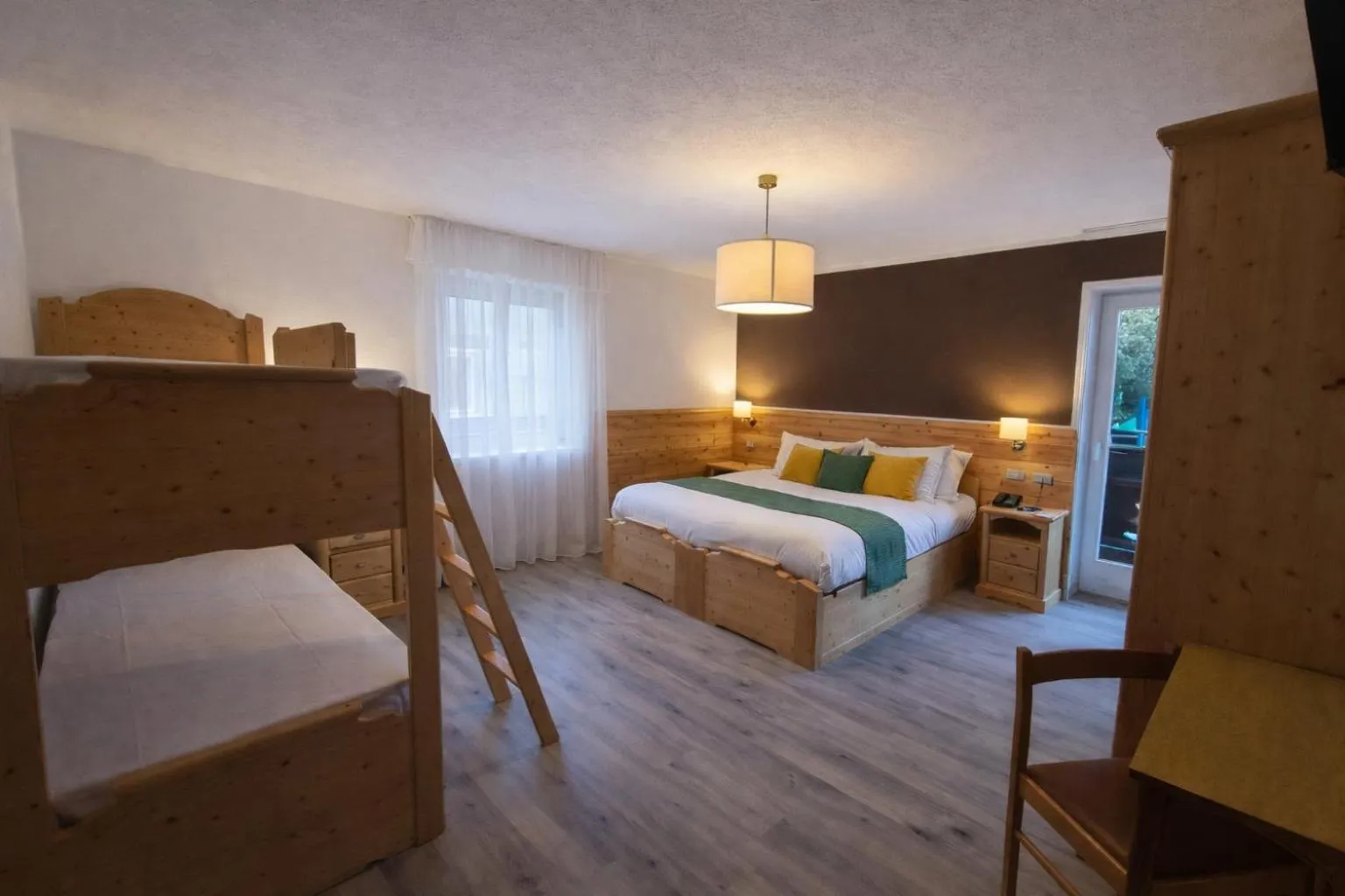 Bed in Hotel Rododendro Val di Fassa