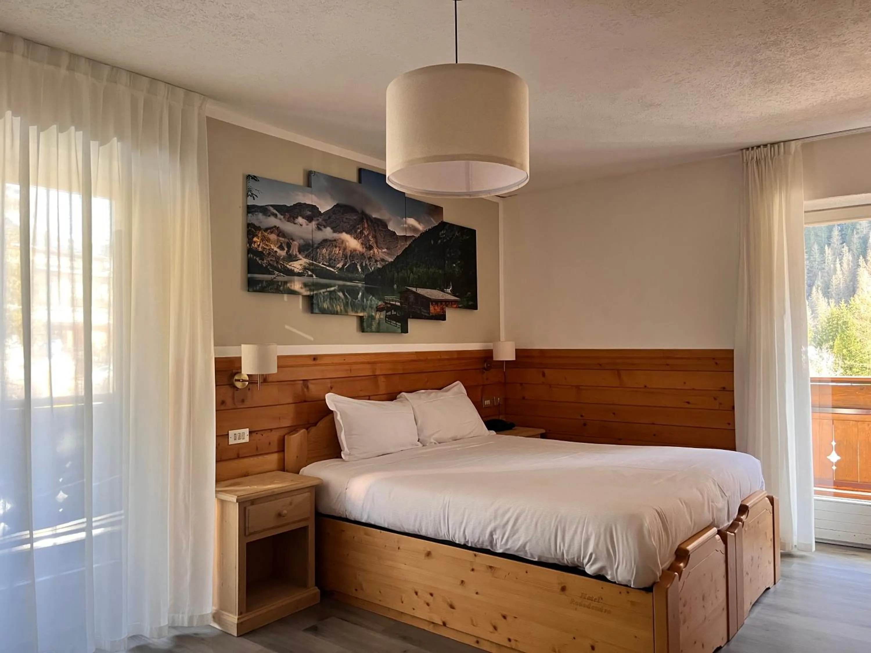 Bed in Hotel Rododendro Val di Fassa