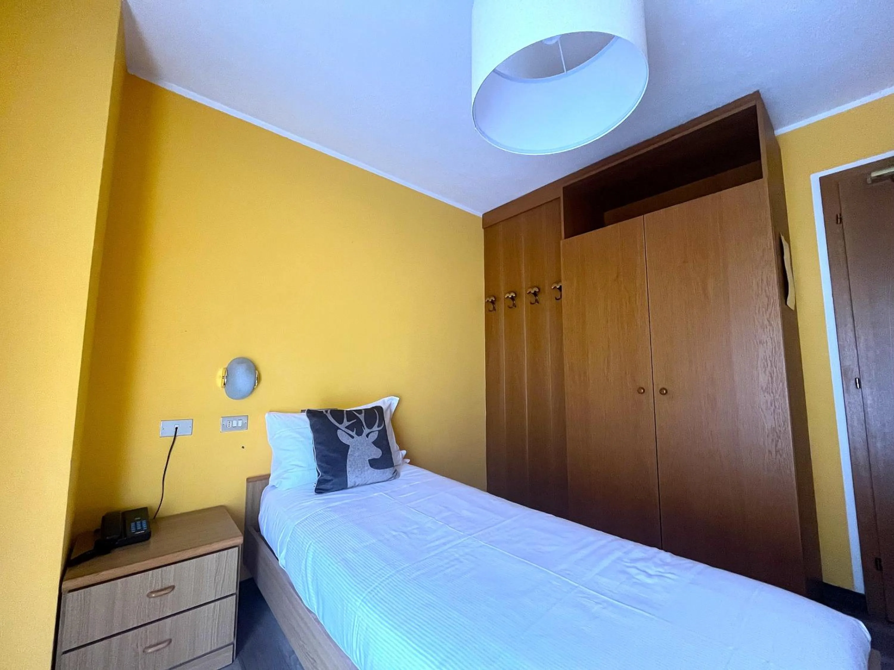 Bed in Hotel Rododendro Val di Fassa