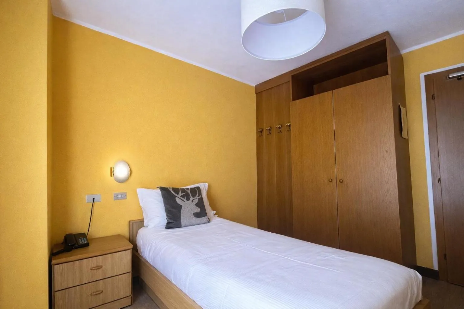 Bed in Hotel Rododendro Val di Fassa