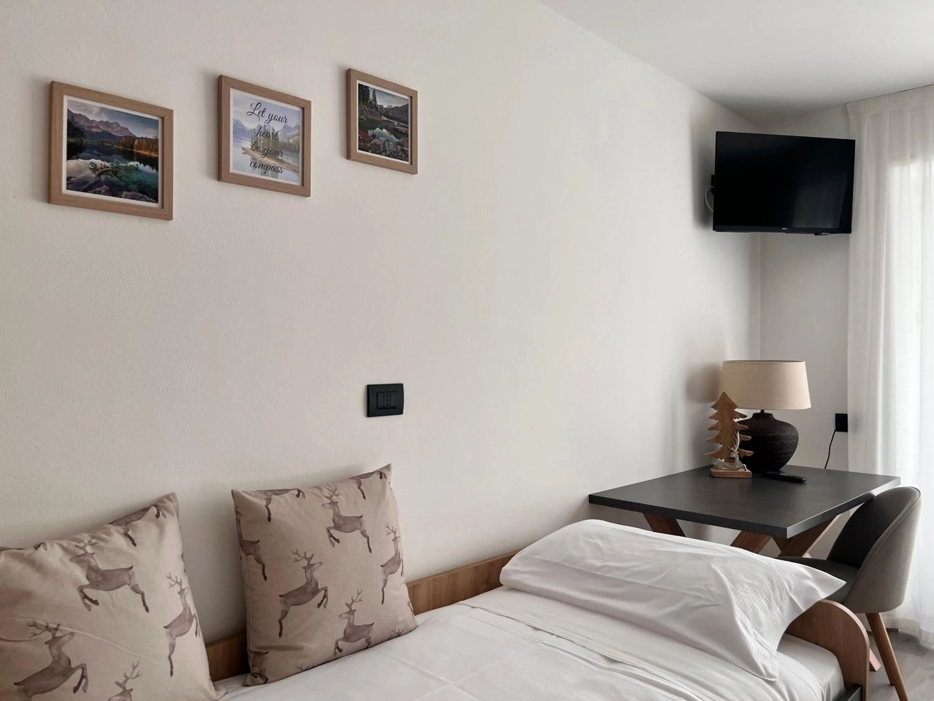 Bed in Hotel Rododendro Val di Fassa