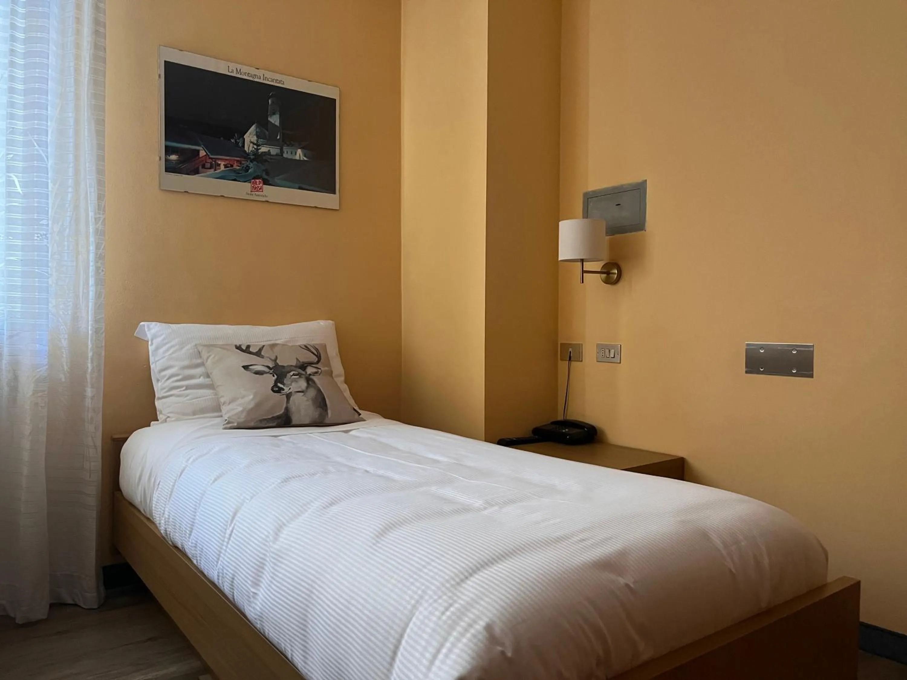 Bed in Hotel Rododendro Val di Fassa