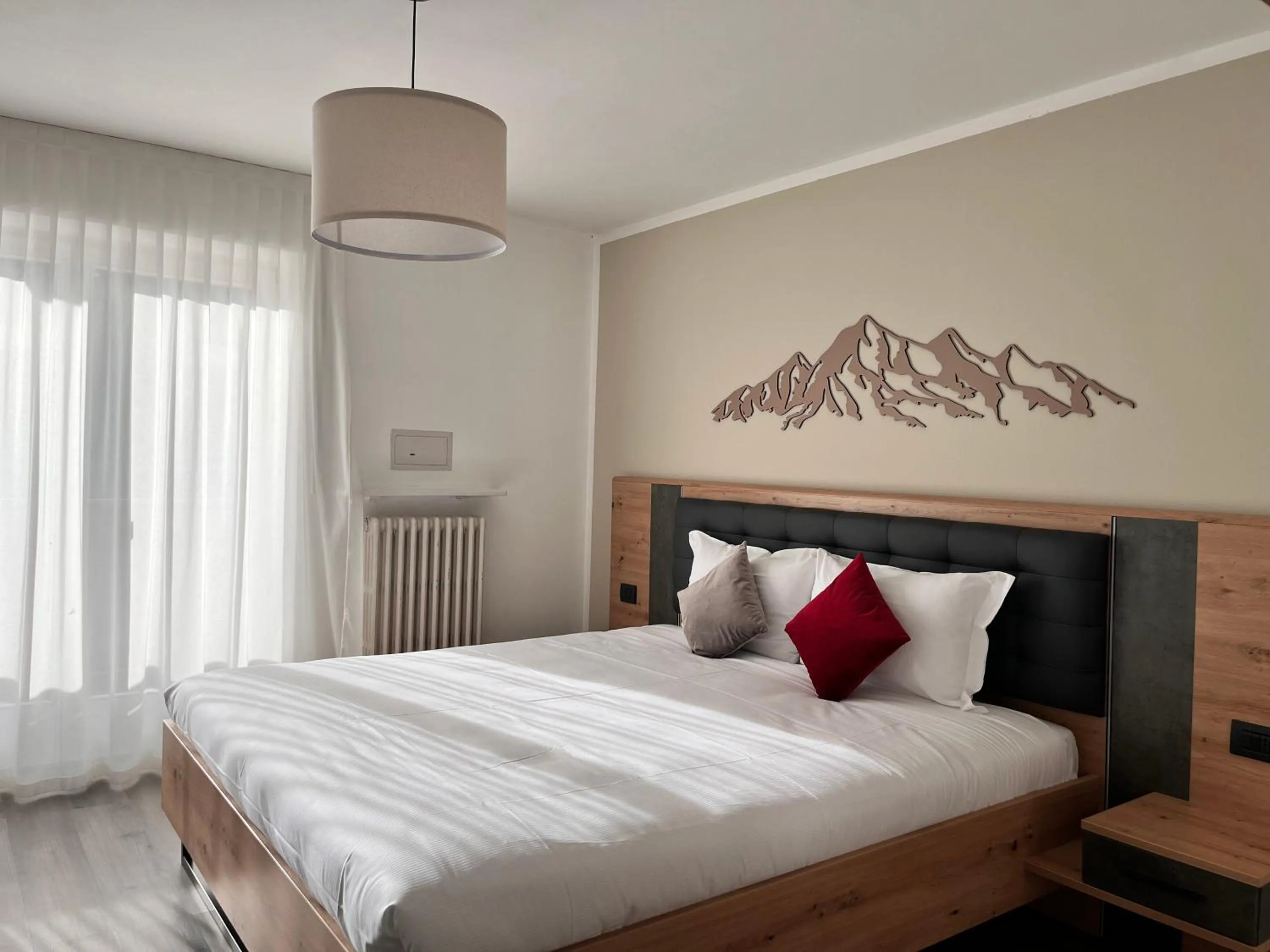 Bed in Hotel Rododendro Val di Fassa