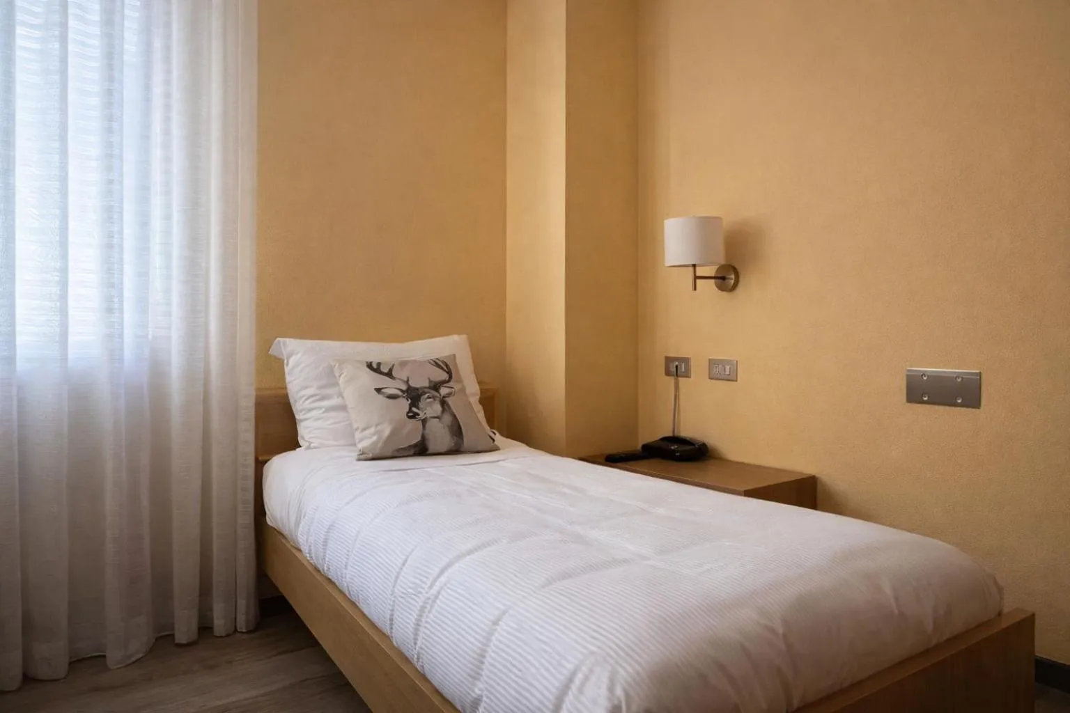 Bed in Hotel Rododendro Val di Fassa