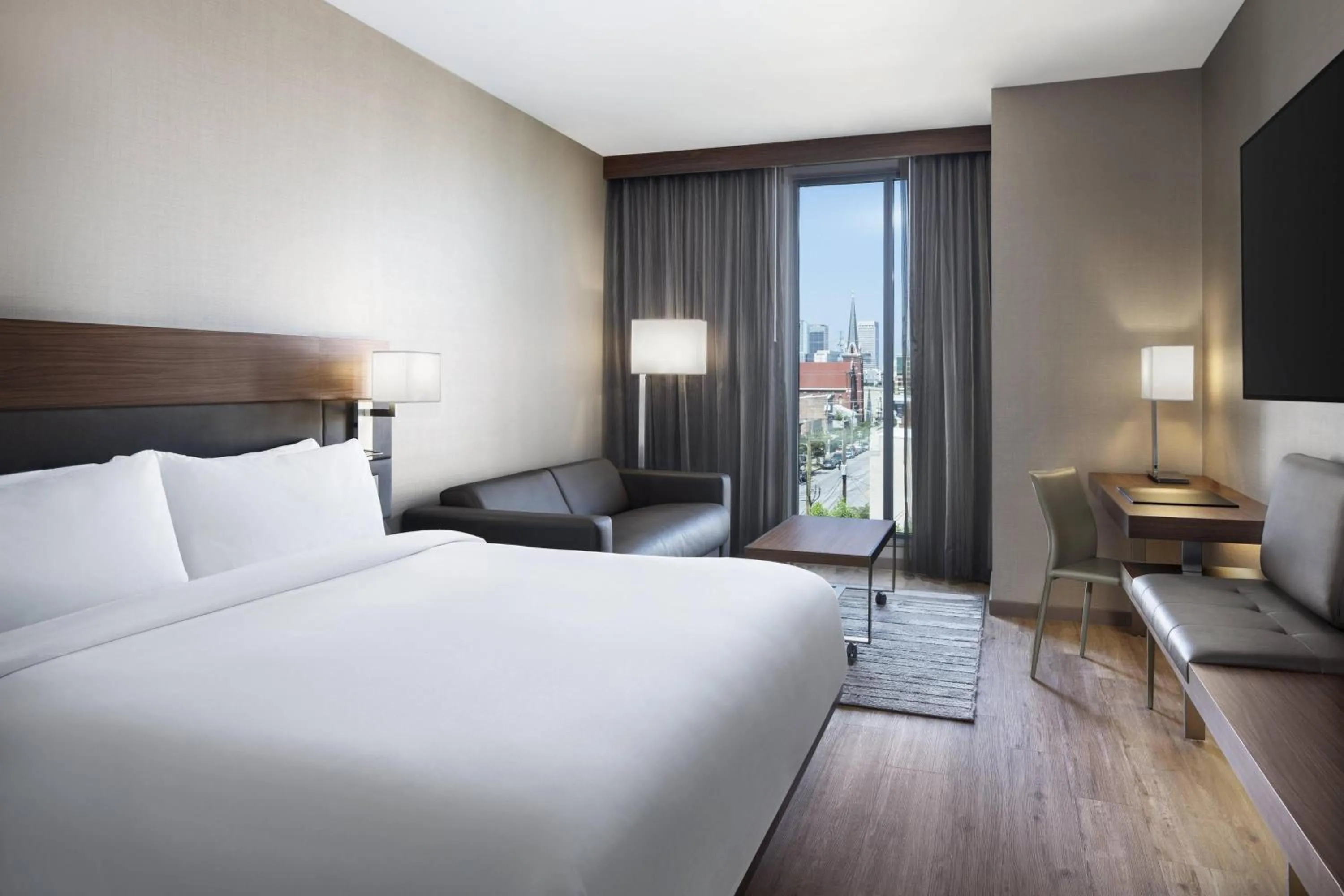 Photo of the whole room, Bed in AC Hotel by Marriott Louisville Downtown
