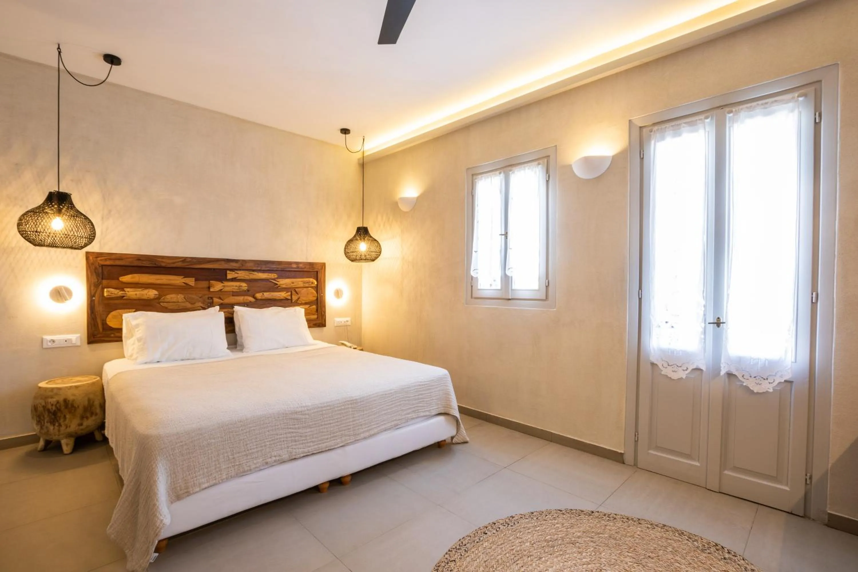 Bed in Aegean Village Beachfront Resort