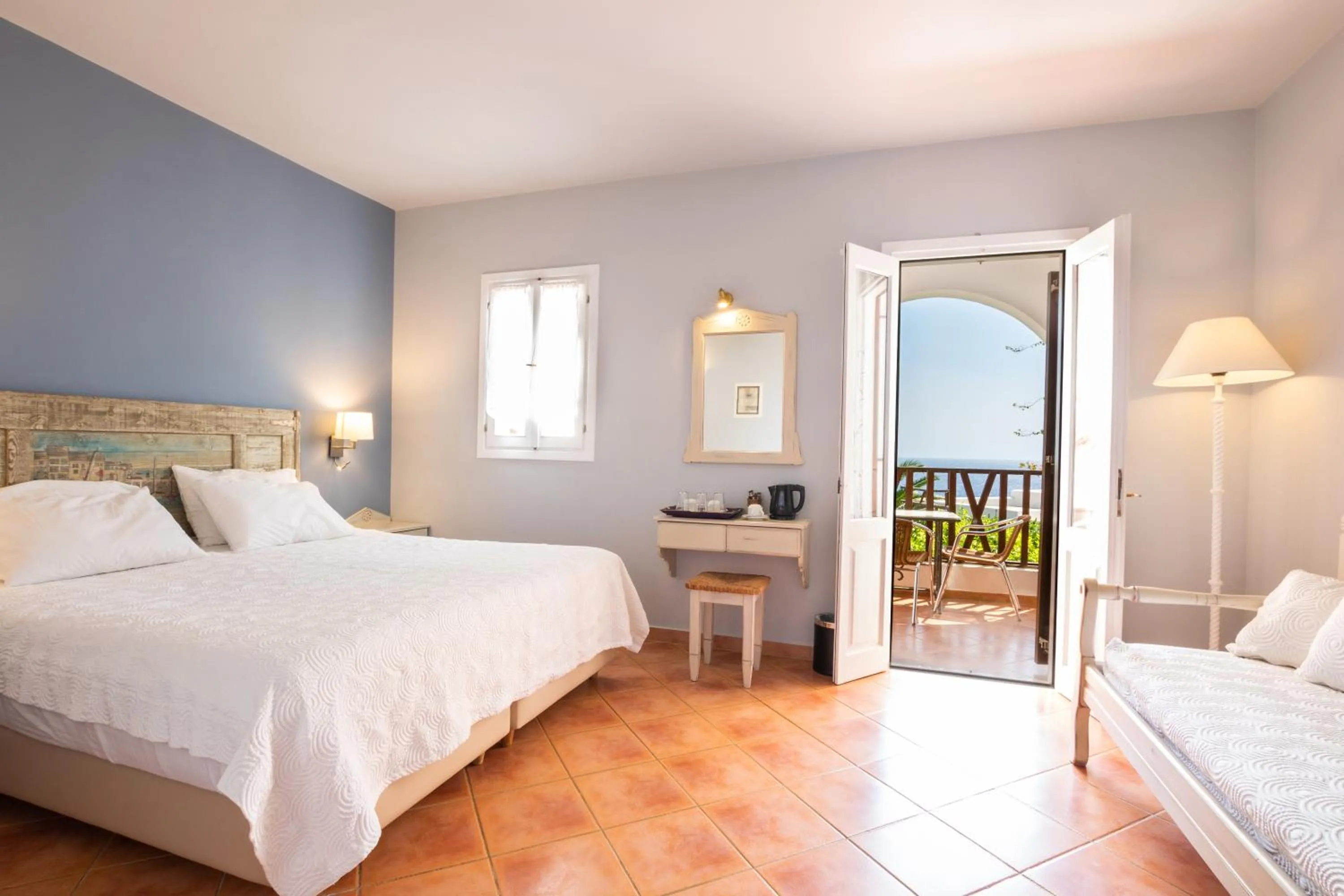 Bed in Aegean Village Beachfront Resort