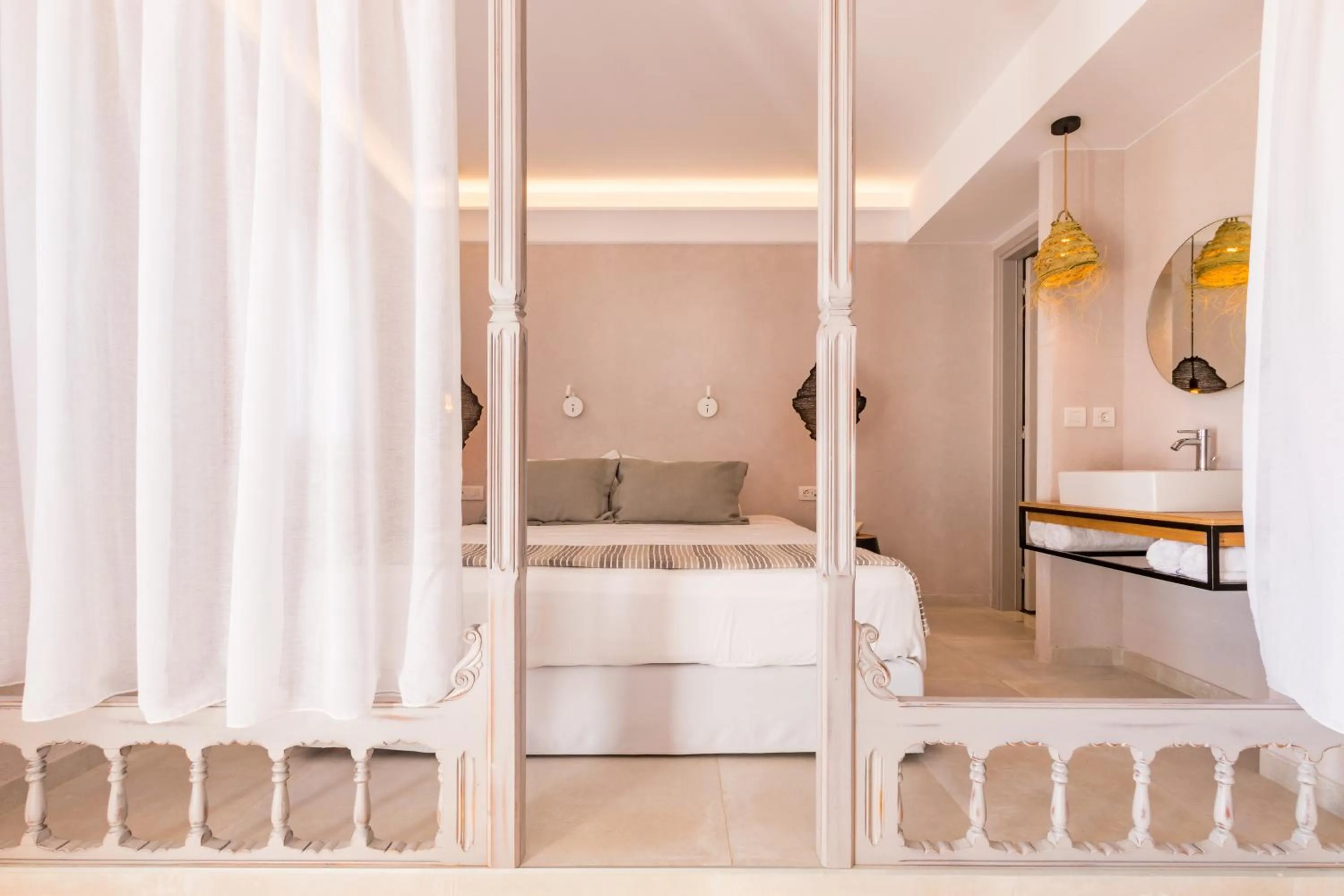 Bed in Aegean Village Beachfront Resort