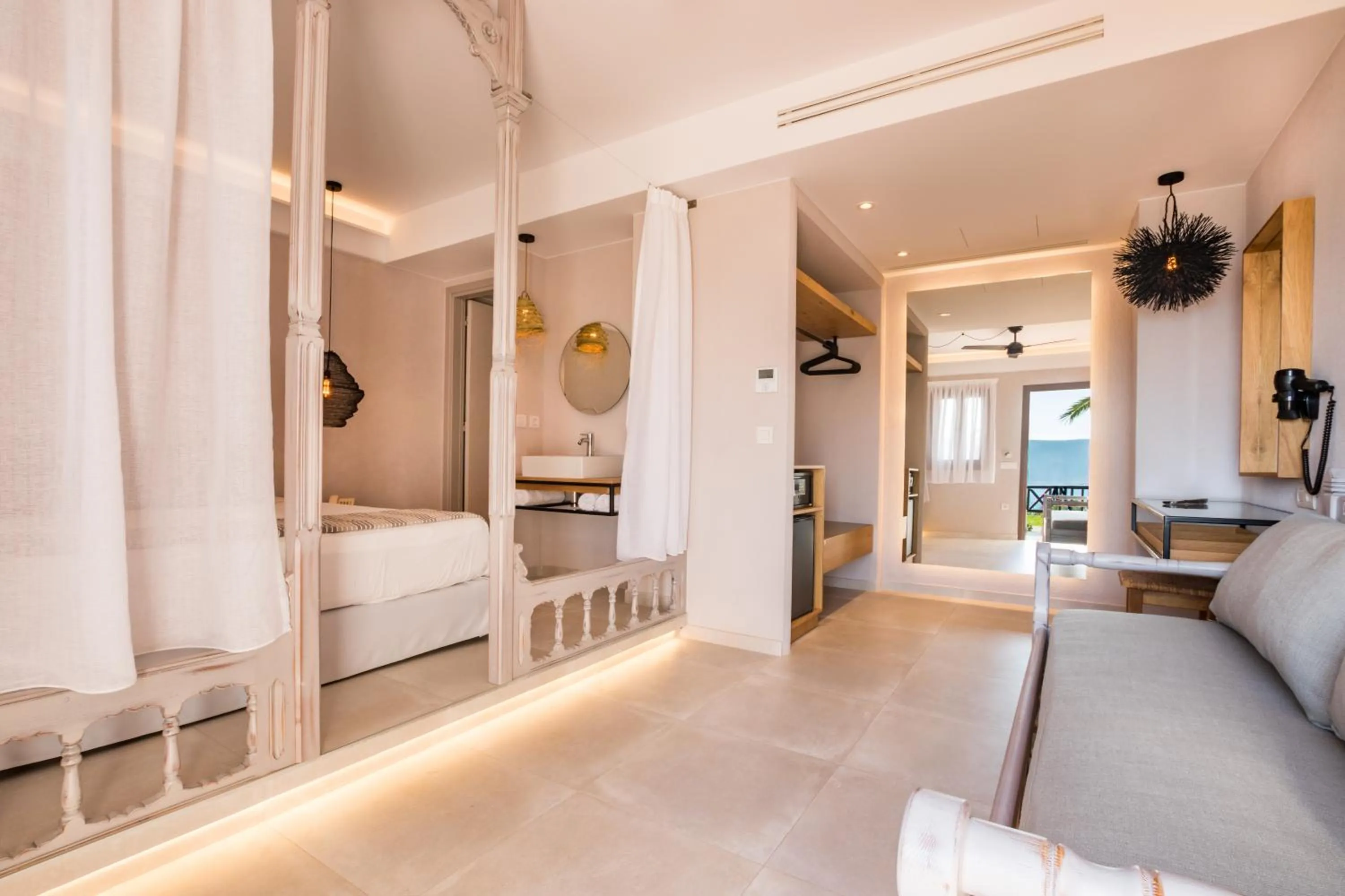 Bed in Aegean Village Beachfront Resort