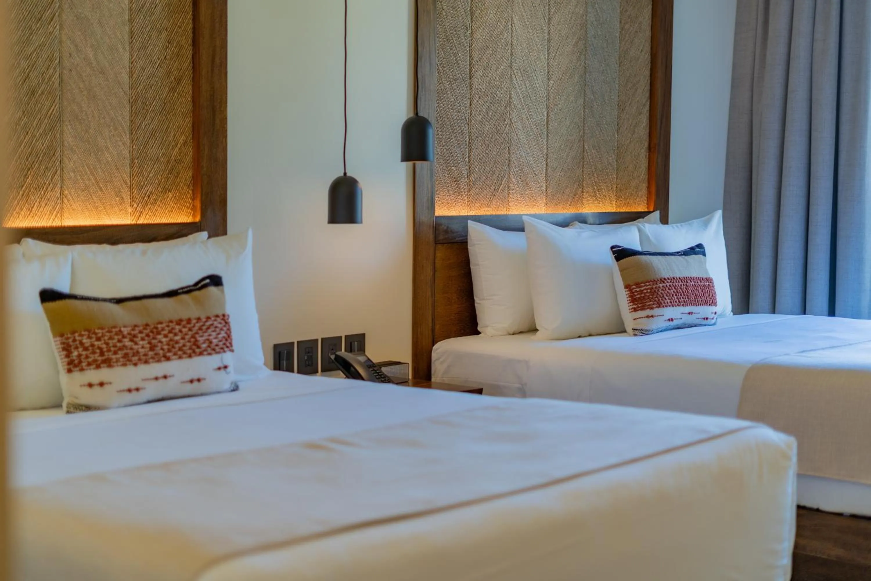 Photo of the whole room, Bed in Hotel Indigo La Paz Puerta Cortes by IHG