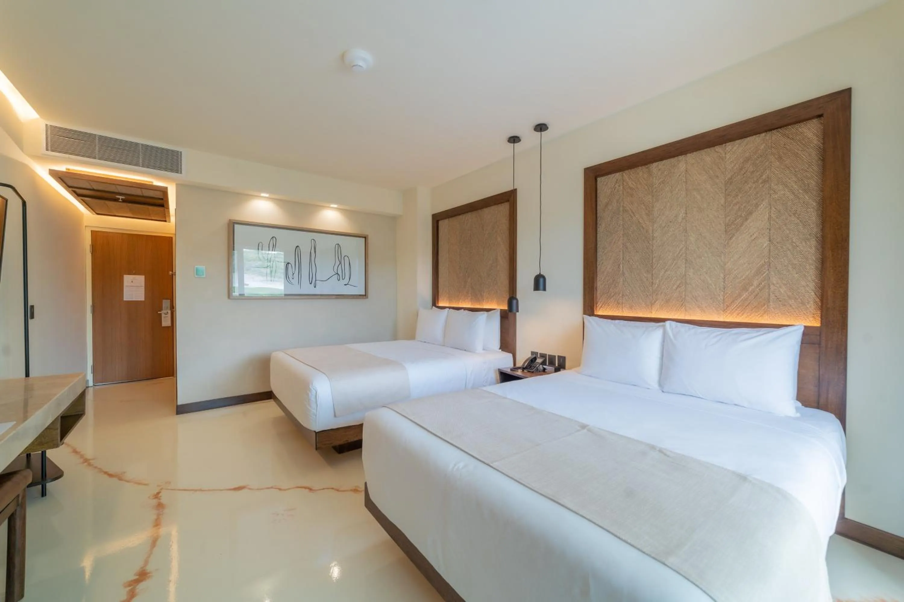 Photo of the whole room, Bed in Hotel Indigo La Paz Puerta Cortes by IHG