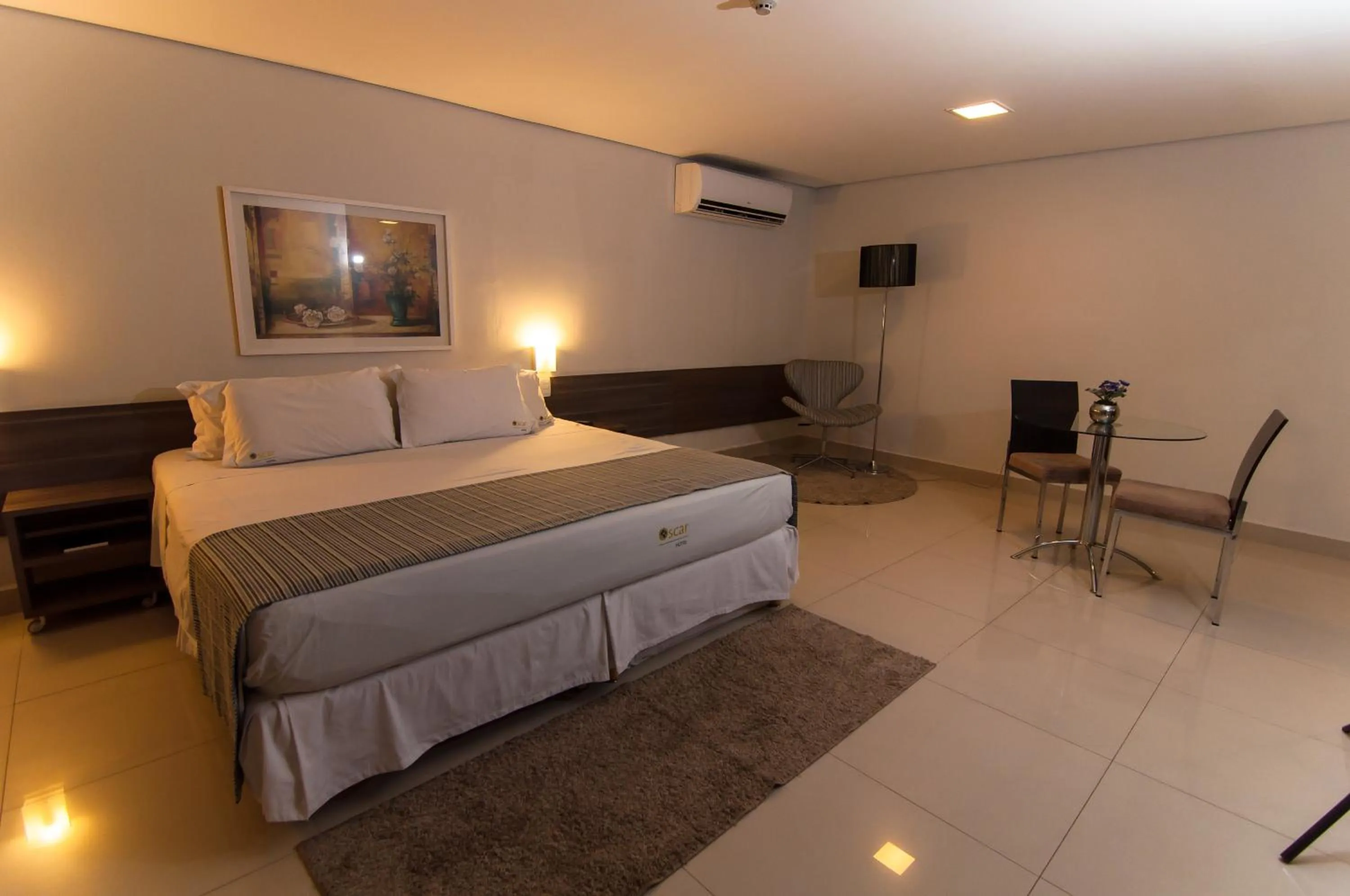 Bed in Oscar Hotel Executive