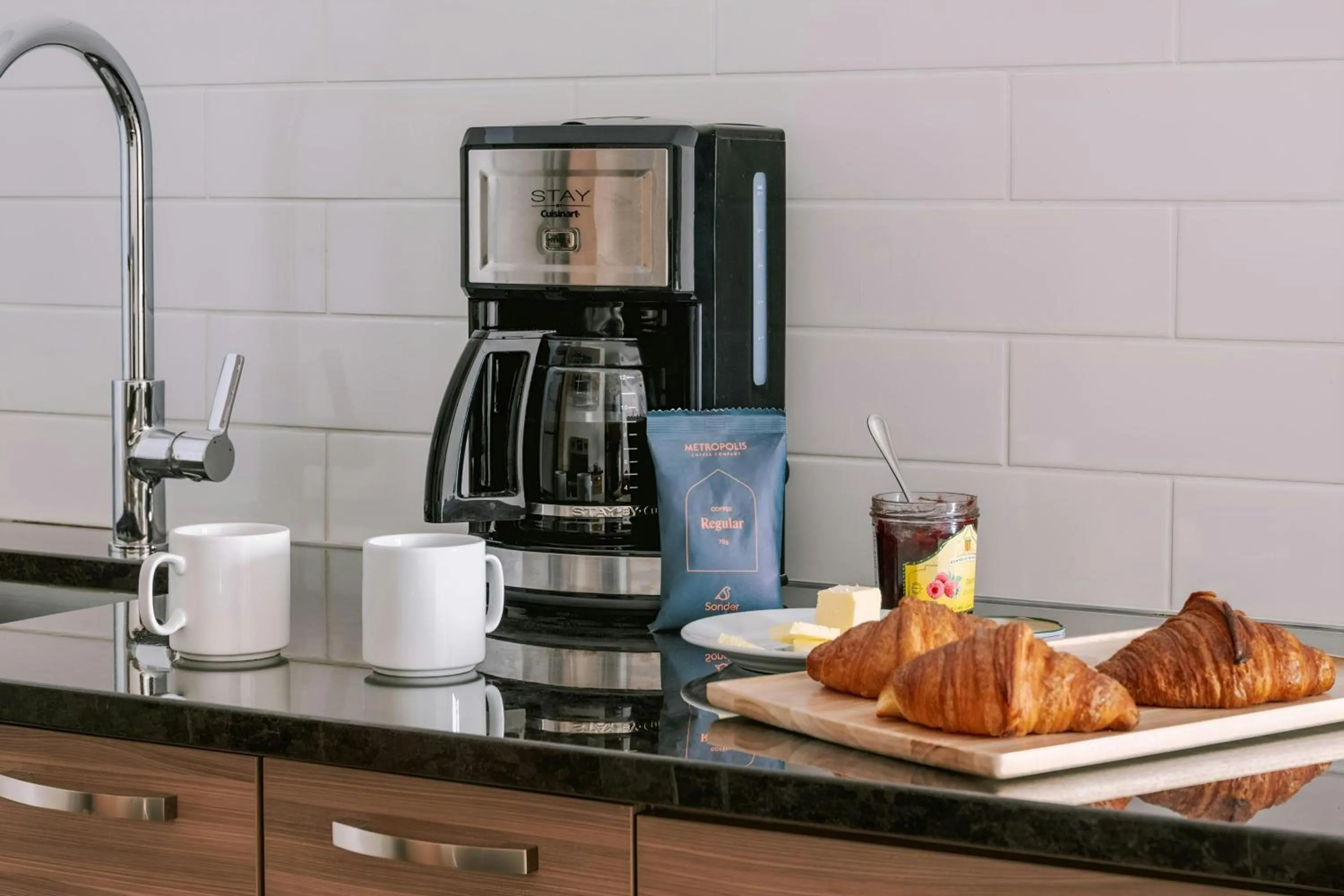 Kitchen or kitchenette in Sonder by Marriott Bonvoy Penny Lane Apartments Old Montreal