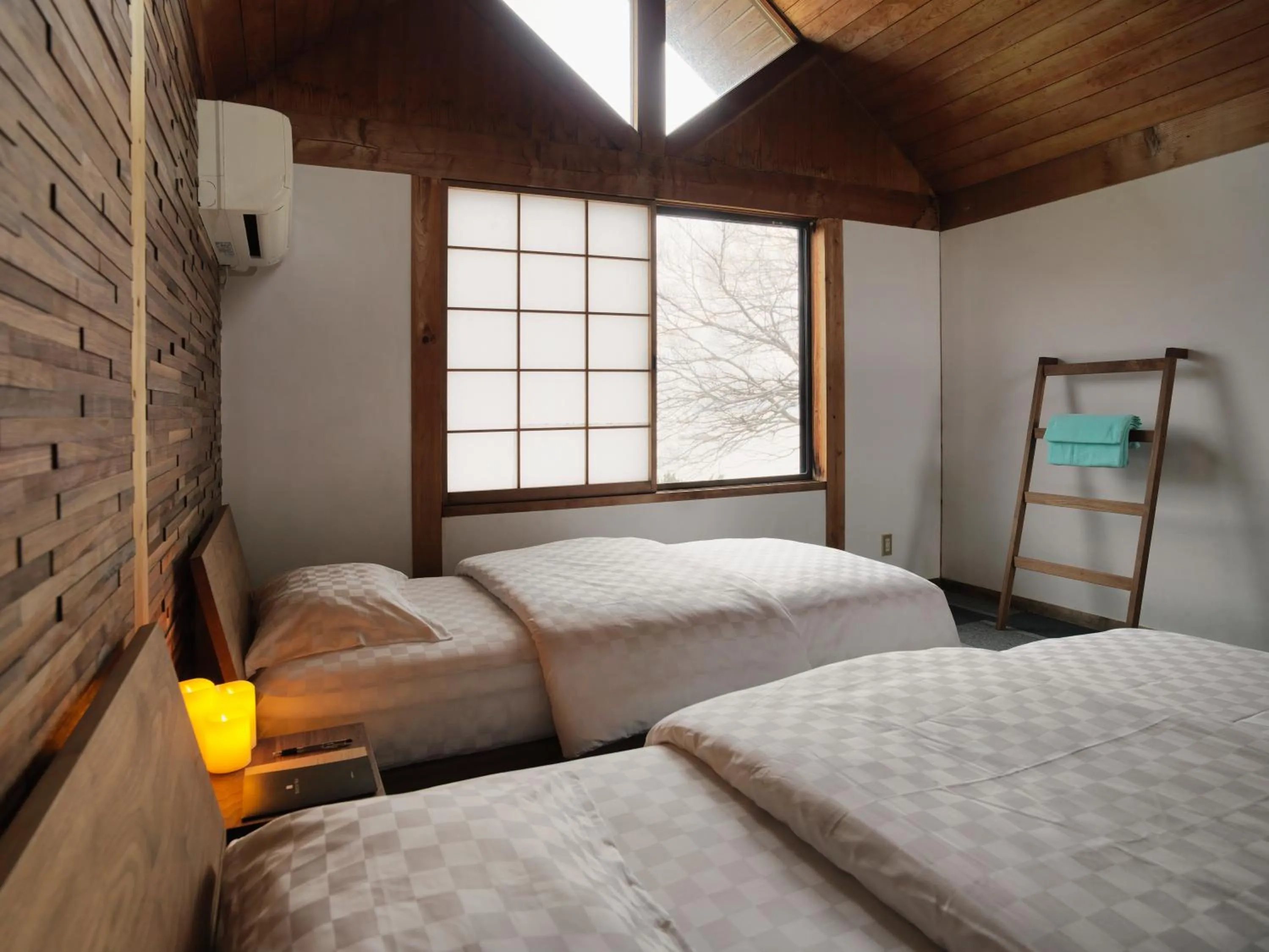 Bed in Shiraishi Island International Villa