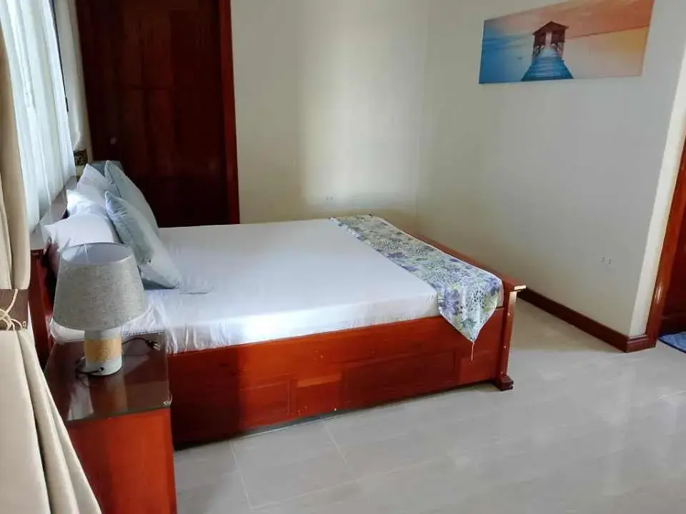 Bed in Ocean Breeze Resort Bed in Ocean Breeze Resort