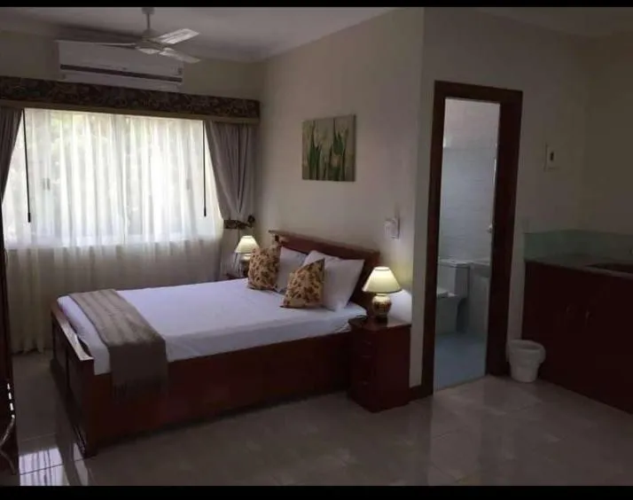 Bed in Ocean Breeze Resort