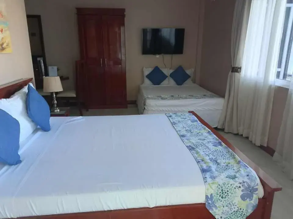 Bed in Ocean Breeze Resort Bed in Ocean Breeze Resort