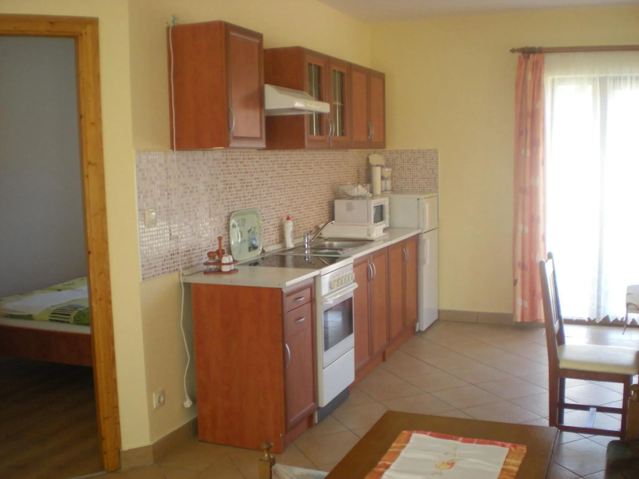 Kitchen or kitchenette in Parti Panzió