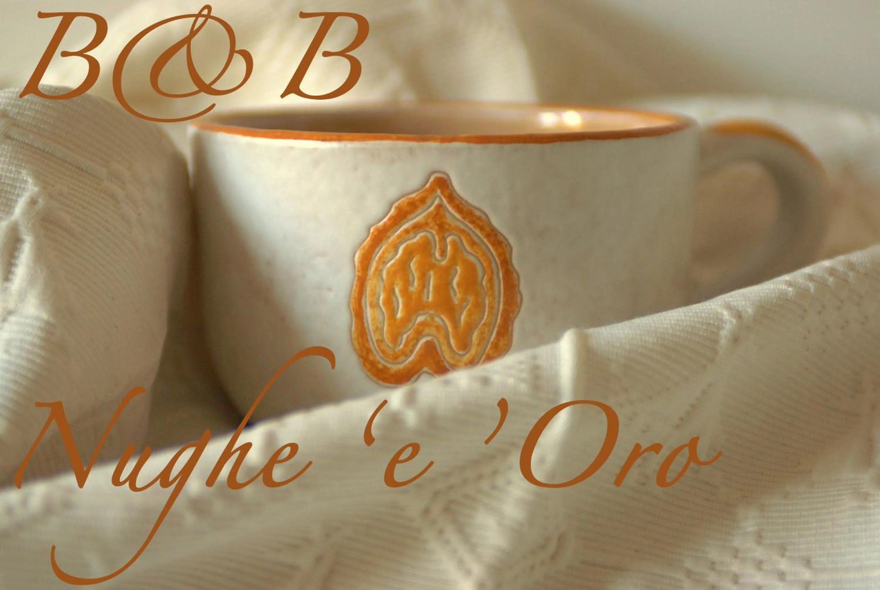 Property logo or sign in Nughe 'e' Oro Guesthouse