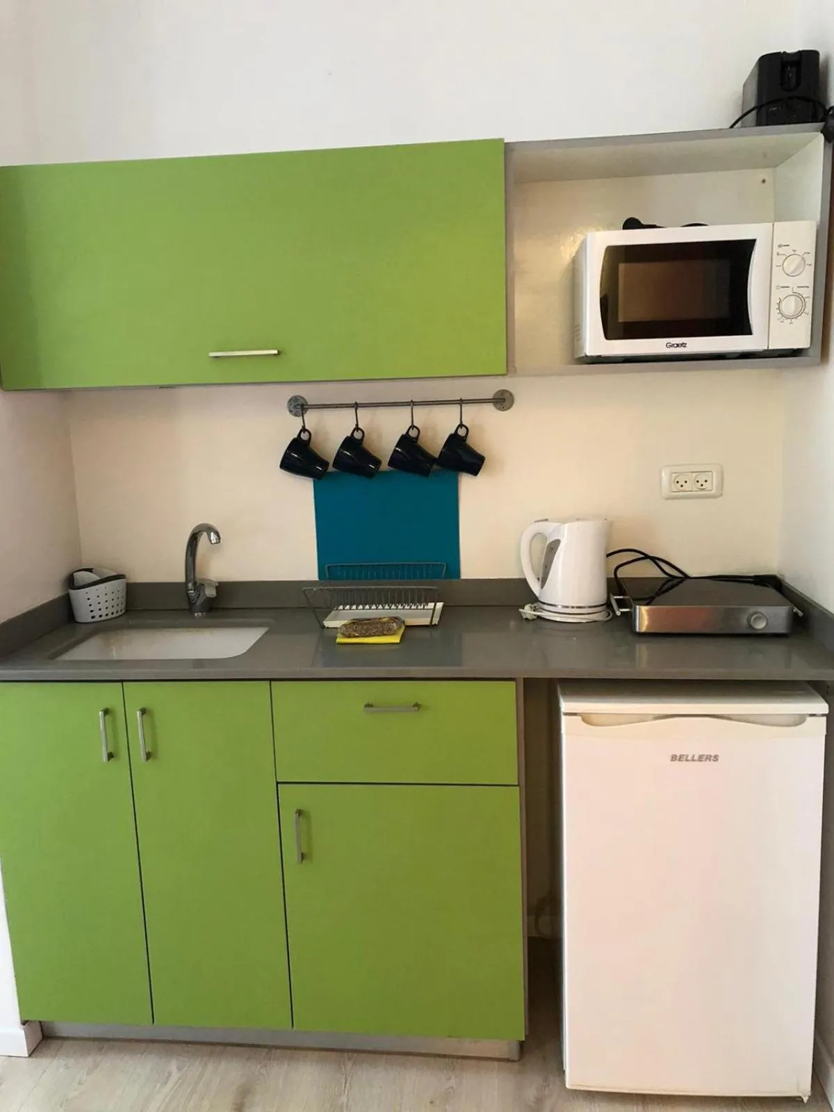 Kitchen or kitchenette in G38 Rental Apartment Building
