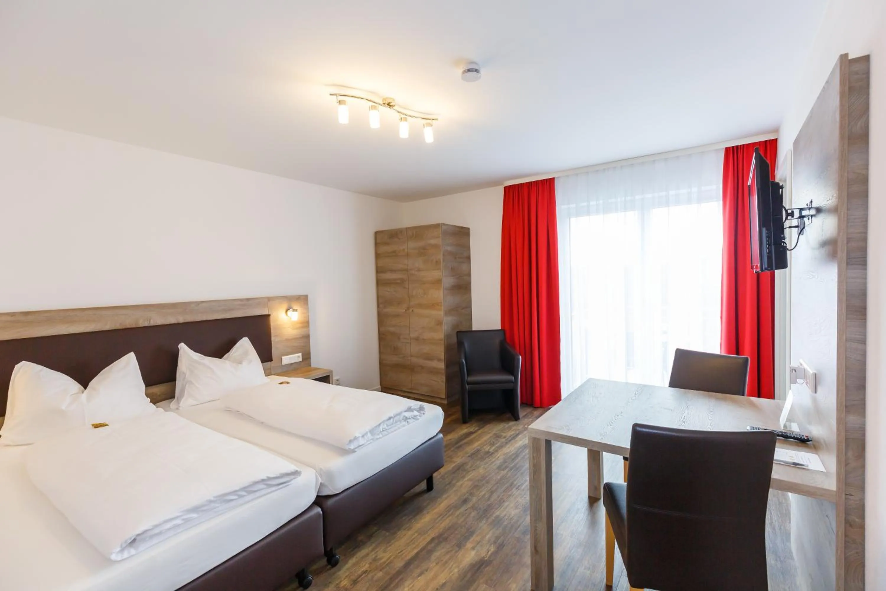 Photo of the whole room, Bed in Come IN Comfort