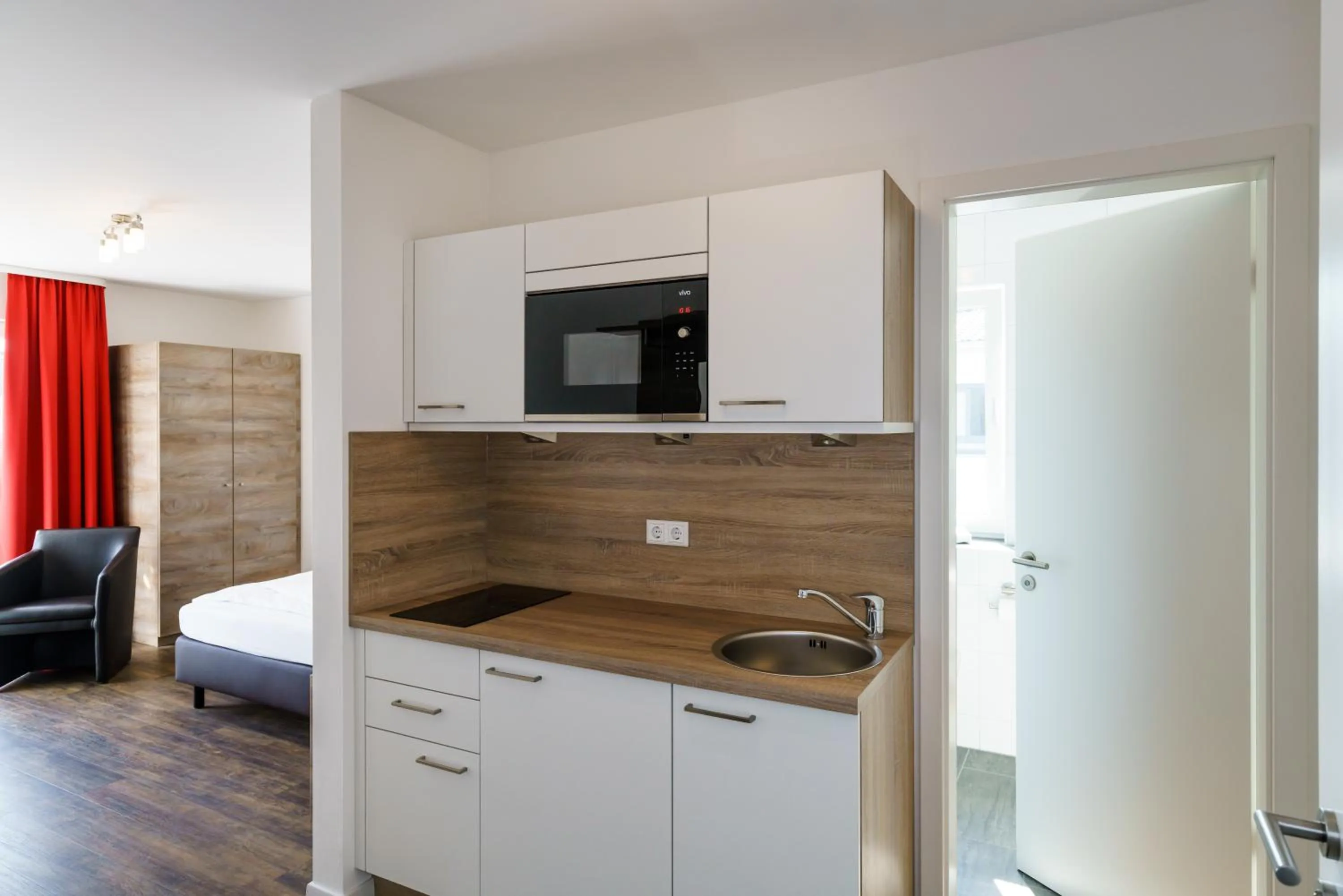 Photo of the whole room, Bed in Come IN Comfort