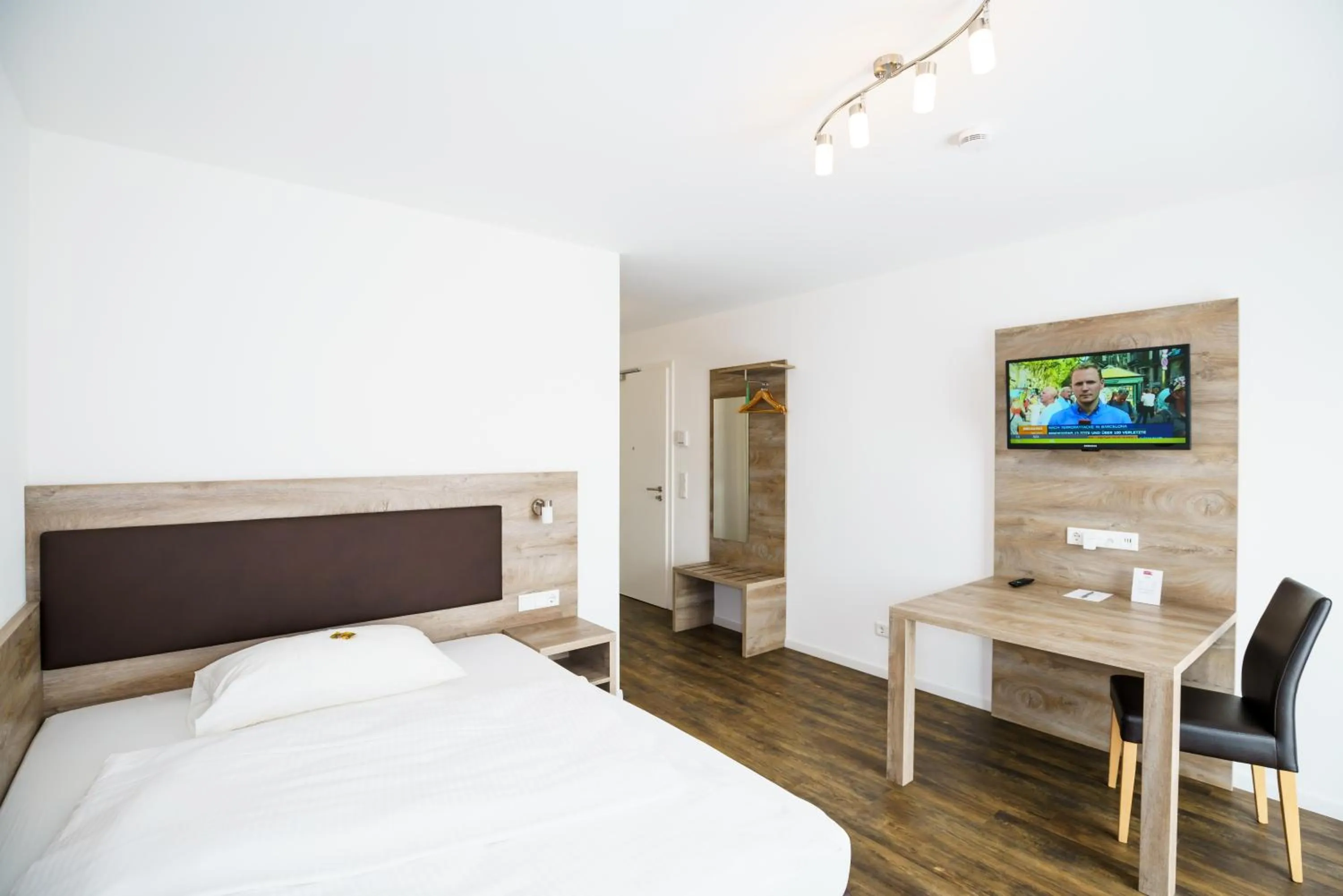 Photo of the whole room, Bed in Come IN Comfort