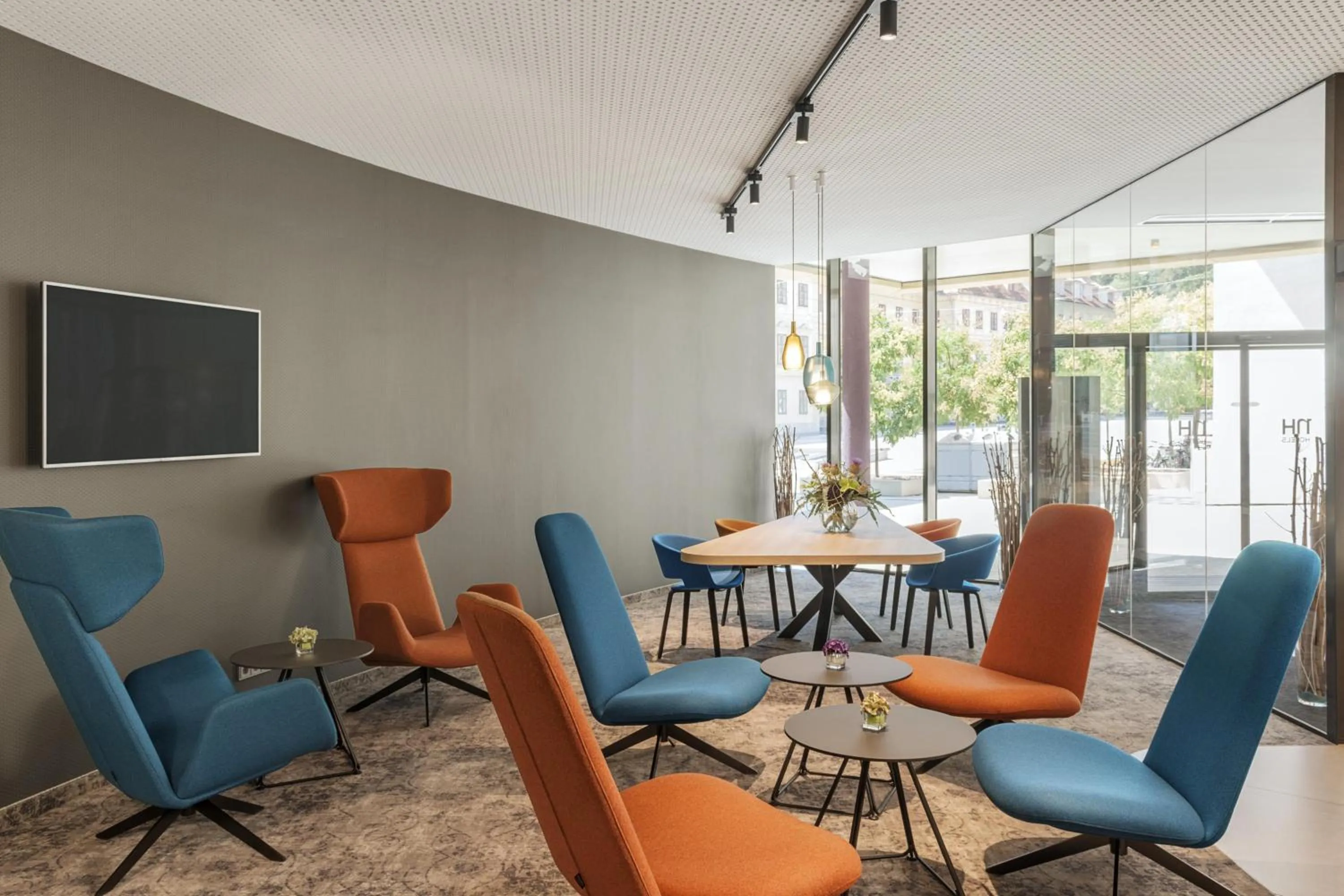 Lobby or reception in NH Graz City