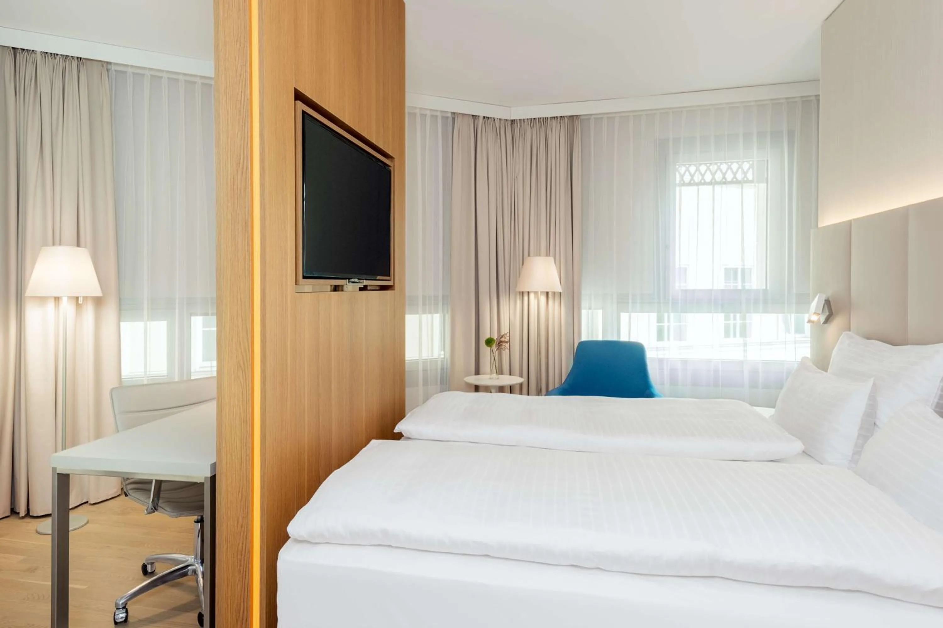 Photo of the whole room, Bed in NH Graz City