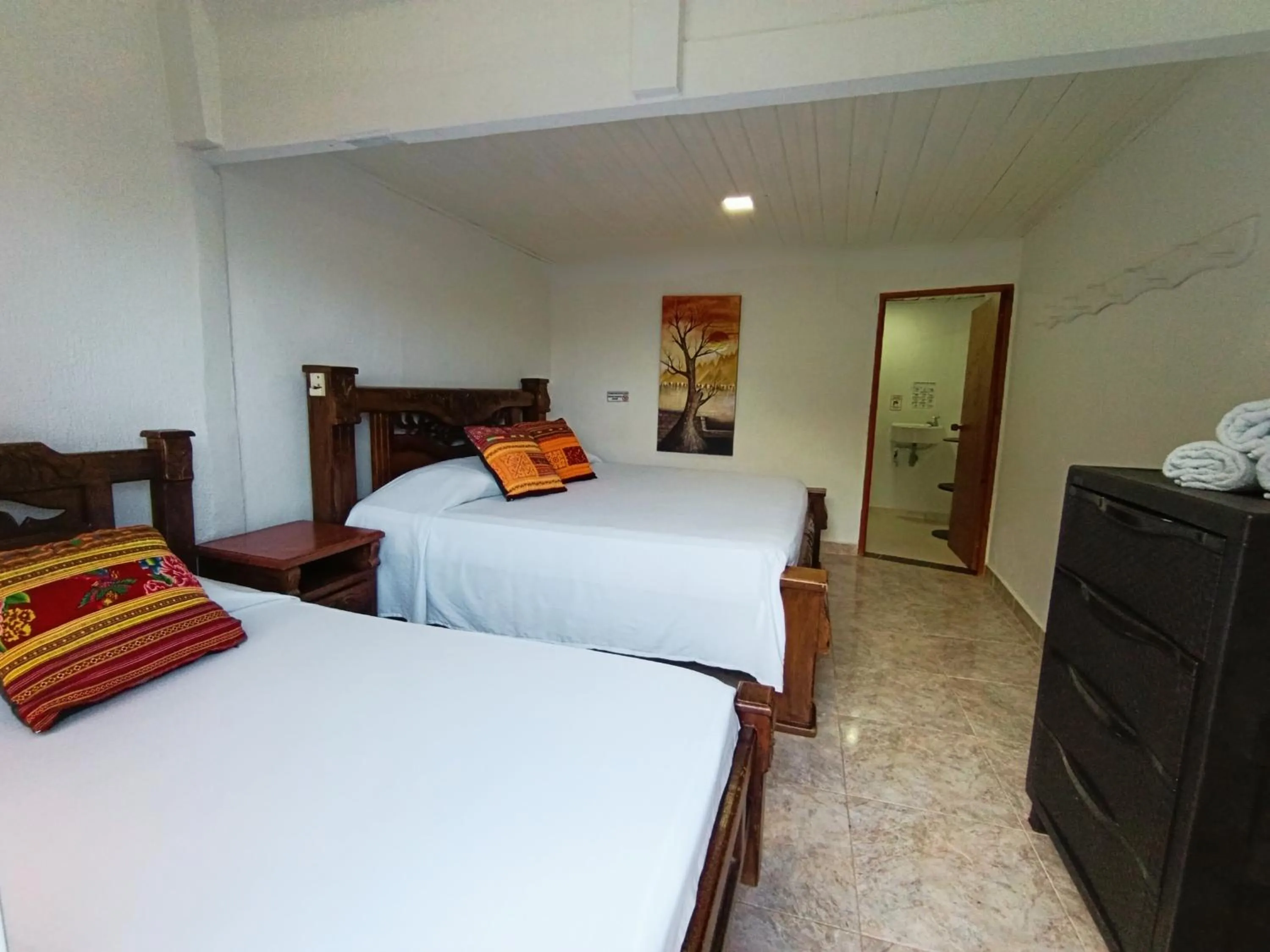 Photo of the whole room, Bed in The Rock House Eco