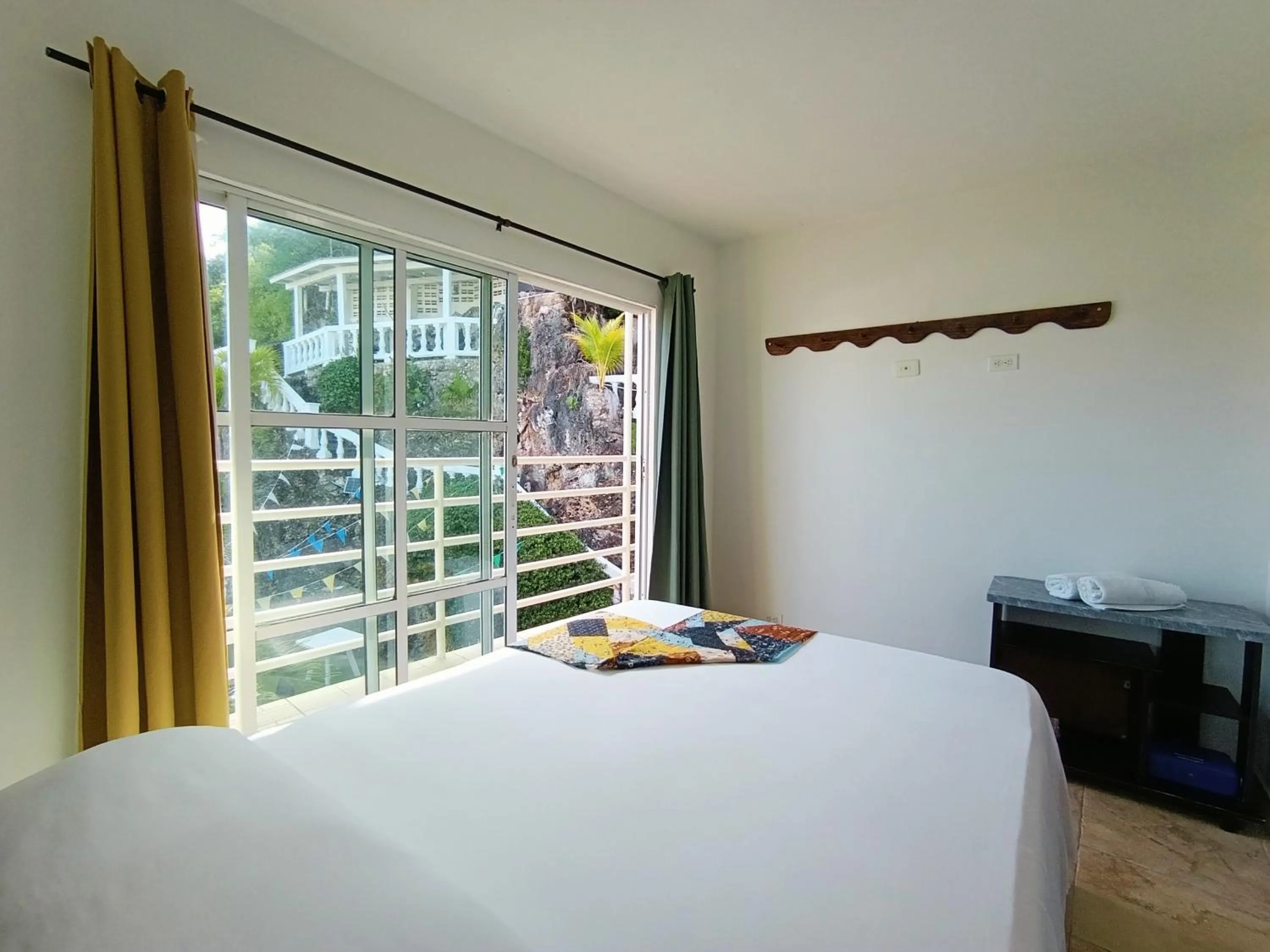 Photo of the whole room, Bed in The Rock House Eco