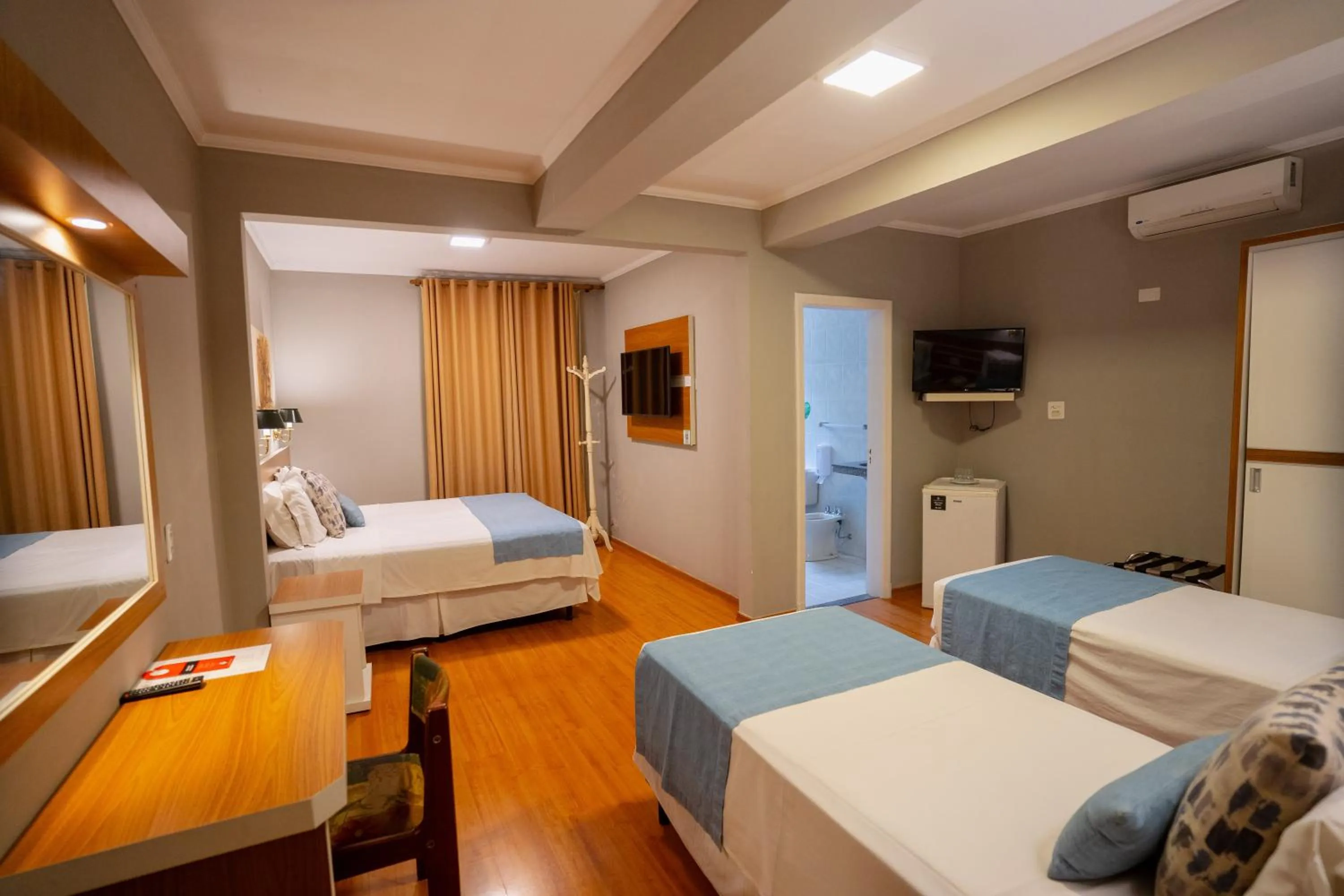 Bed in Hotel Minas Gerais