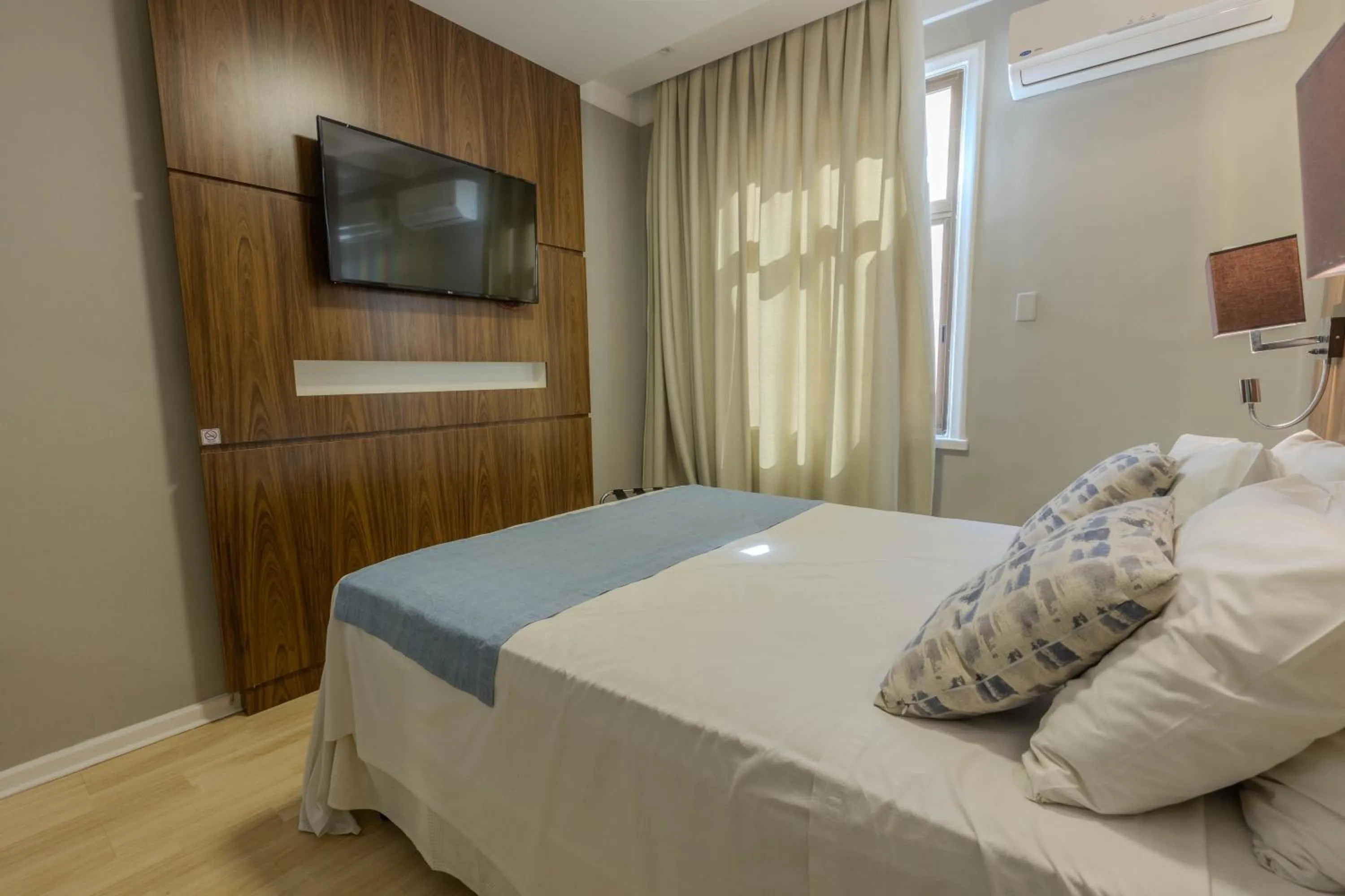 Bed in Hotel Minas Gerais