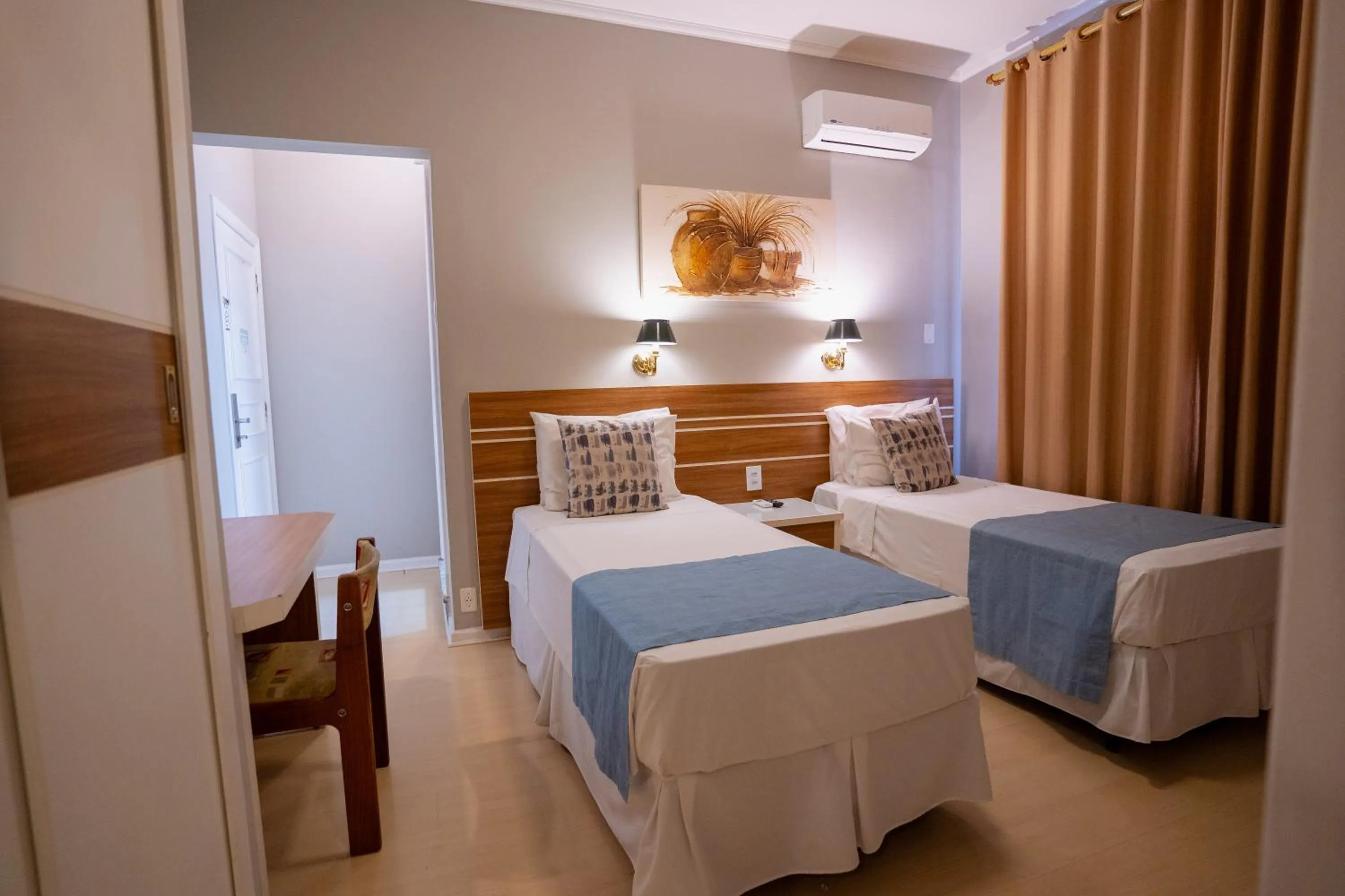 Bed in Hotel Minas Gerais