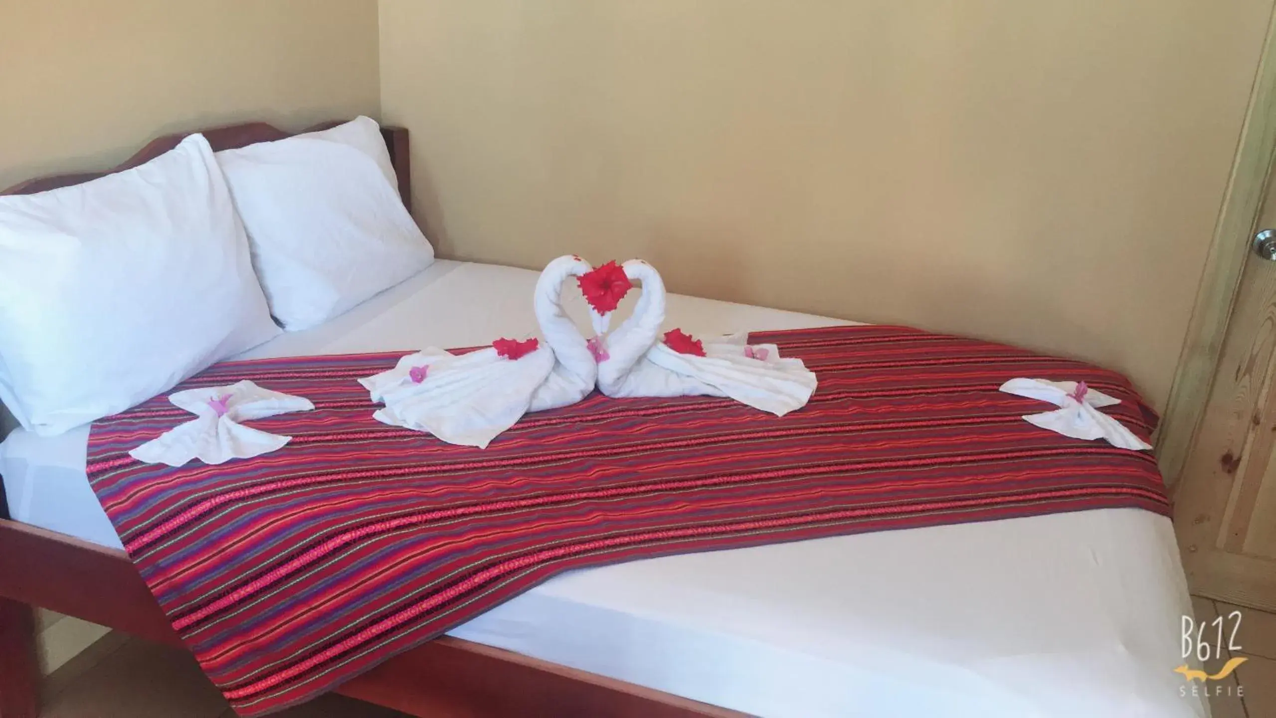 Bed in Ambergris Sunset Hotel Bed in Ambergris Sunset Hotel