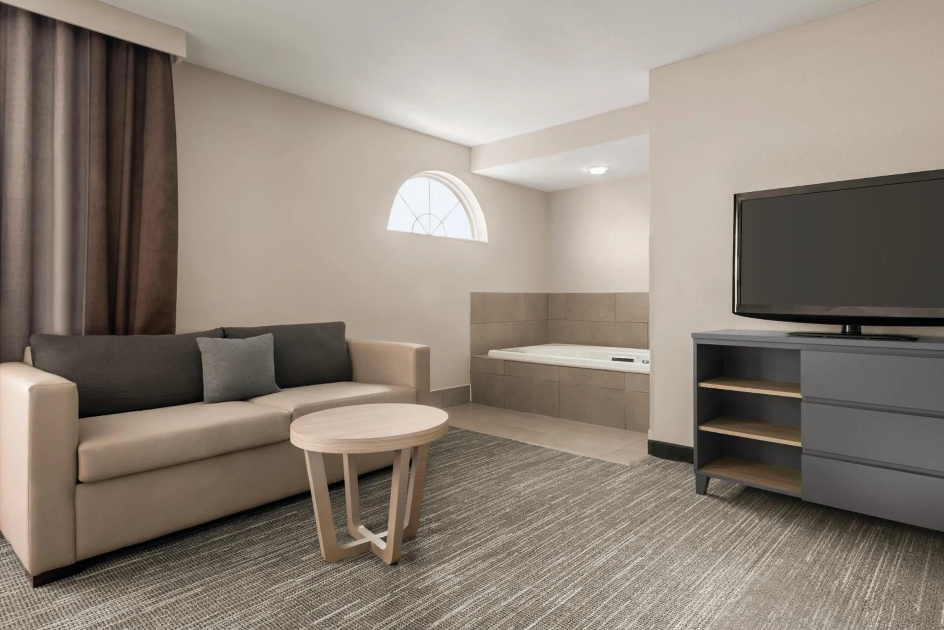 Seating area in Country Inn & Suites by Radisson, Dubuque, IA