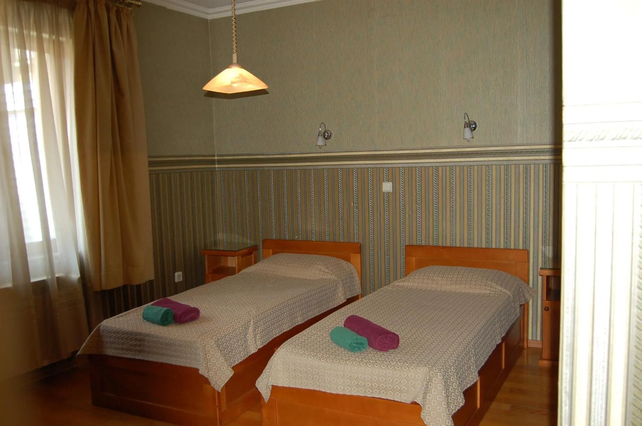 Bed in Kniaz Boris Hotel