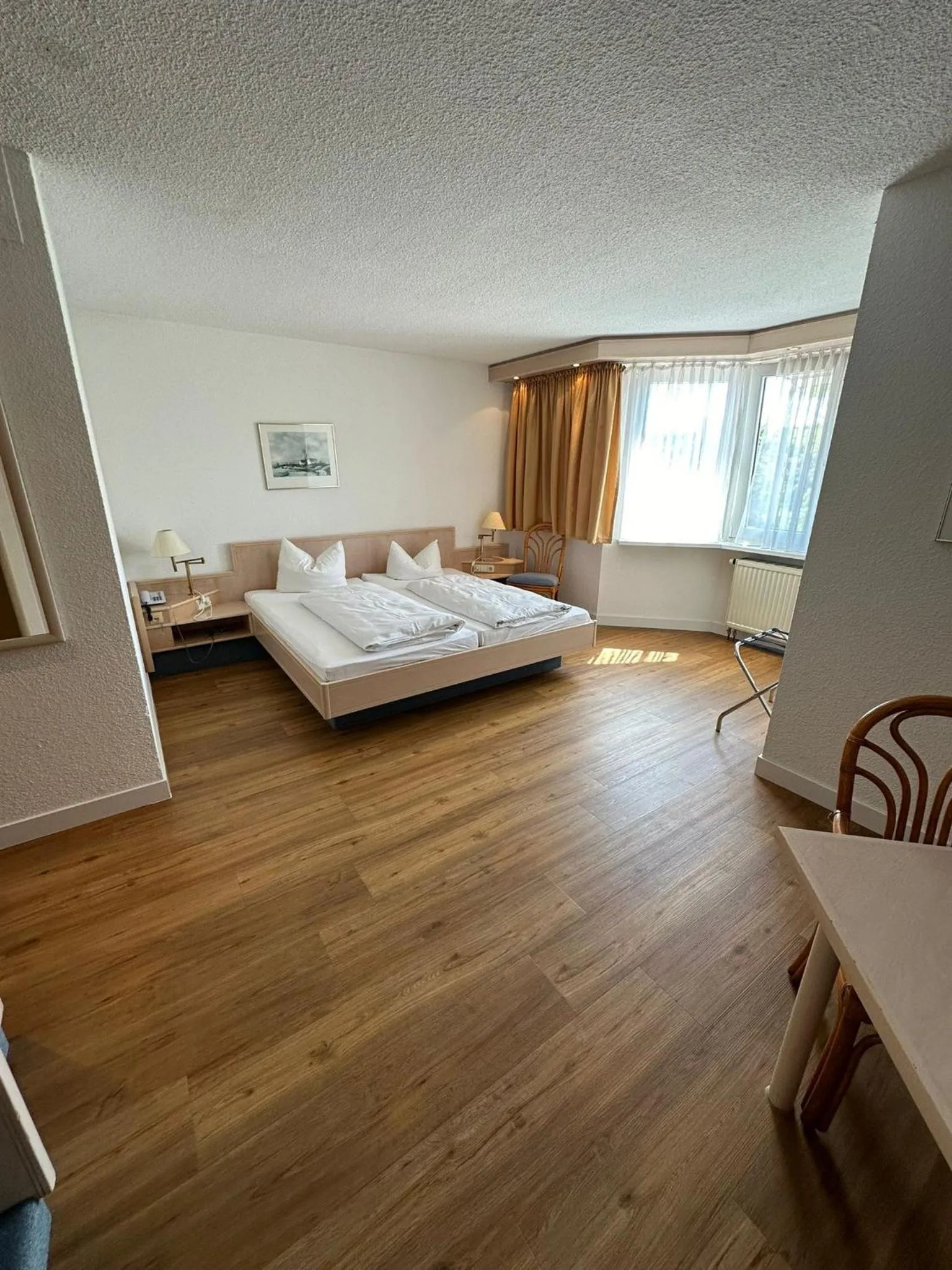 Photo of the whole room, Bed in Hotel Aichtaler Hof