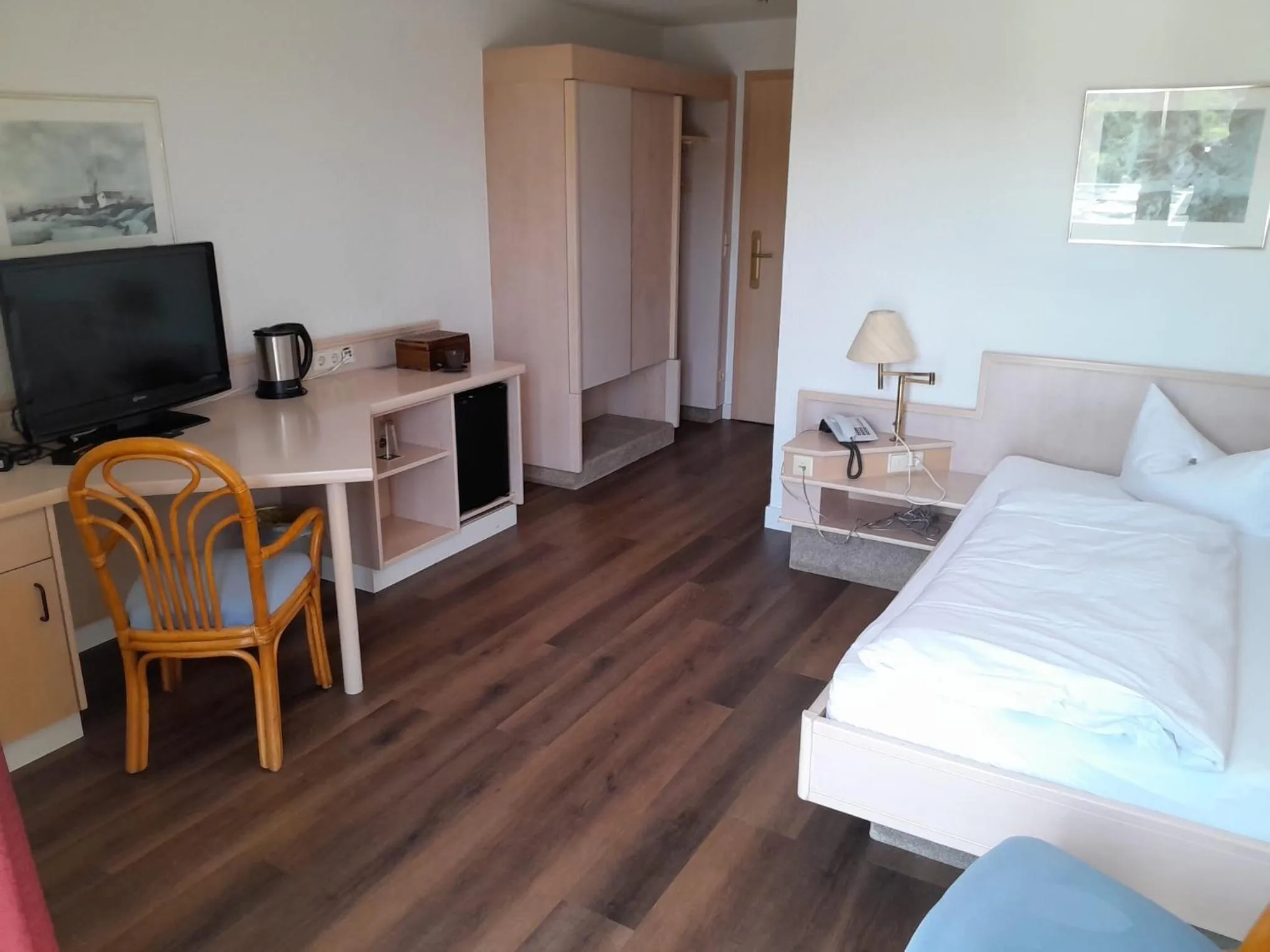 Photo of the whole room, Bed in Hotel Aichtaler Hof